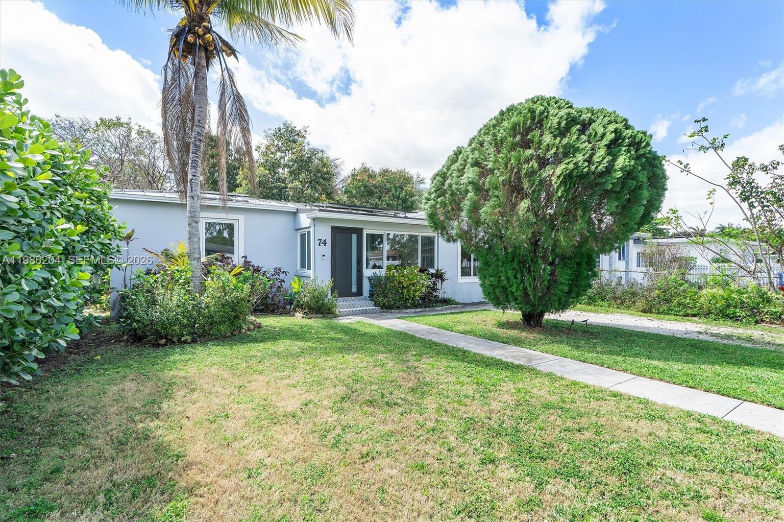 Charming and move-in ready, this North Miami gem is the perfect starter home! Thoughtfully updated throughout, the property features a durable metal roof installed in 2017 and solar panels for added energy efficiency and long-term savings (leased to be taken over by the new buyer). Inside, you’ll find a refreshed interior that blends comfort with modern touches.

Step outside to a spacious backyard filled with mature fruit trees—your own private tropical retreat with plenty of room to entertain, garden, or even expand. Ideally located just minutes from Barry University and close to major highways, shopping, and dining, this home offers both convenience and charm. A fantastic opportunity to own in a growing North Miami neighborhood!