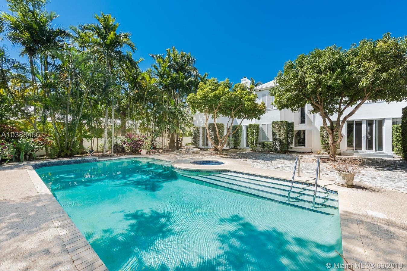 Original architectural masterpiece ready to be restored. One of the very few flow through lots on La Gorce Island. Sitting on an expansive 18,574 SF lot this 5,682 SF two story home boasts 7 bedrooms, 6 bathrooms and 1 half bath. Offering a pool, lush landscaping and 2 driveways, this residence is perfect for a large family and living on coveted and private, La Gorce Island. Features include: Natural light throughout and a 2 car garage. Enjoy living on a quiet street in this guard-gated island, just minutes from the beach, restaurants and more!