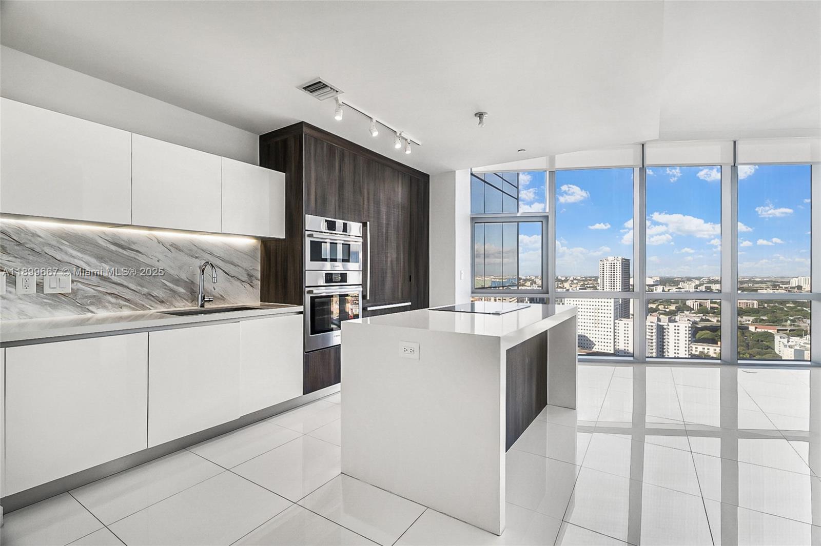 GREAT FOR INVESTORS!!!****Beautiful apartment with incredible view from 28th floor in Luxury PARAMOUNT MIAMI WORLDCENTER*** 1 bed + DEN (ADDITIONAL BEDROOM OR OFFICE) 1 full bath + 1 half bath, European kitchen, 10 ft ceilings, large balcony, floor to ceiling windows***This is one of the famous buildings in the Downtown Miami Area and is known for its 5-star amenities*** Resort-style pool, cabanas, social leisure lounges, wellness spa and salon, kids’ room, state of the art GYM with boxing ring, yoga studio, basketball court, tennis court, BBQ kitchen, virtual golf, recording studio, food market, 24-hour front desk & valet***Located in the heart of Downtown Miami, walking distance to Arena, Performing Art Center, Museums, Miami Dade college, Bayside shops, restaurants etc