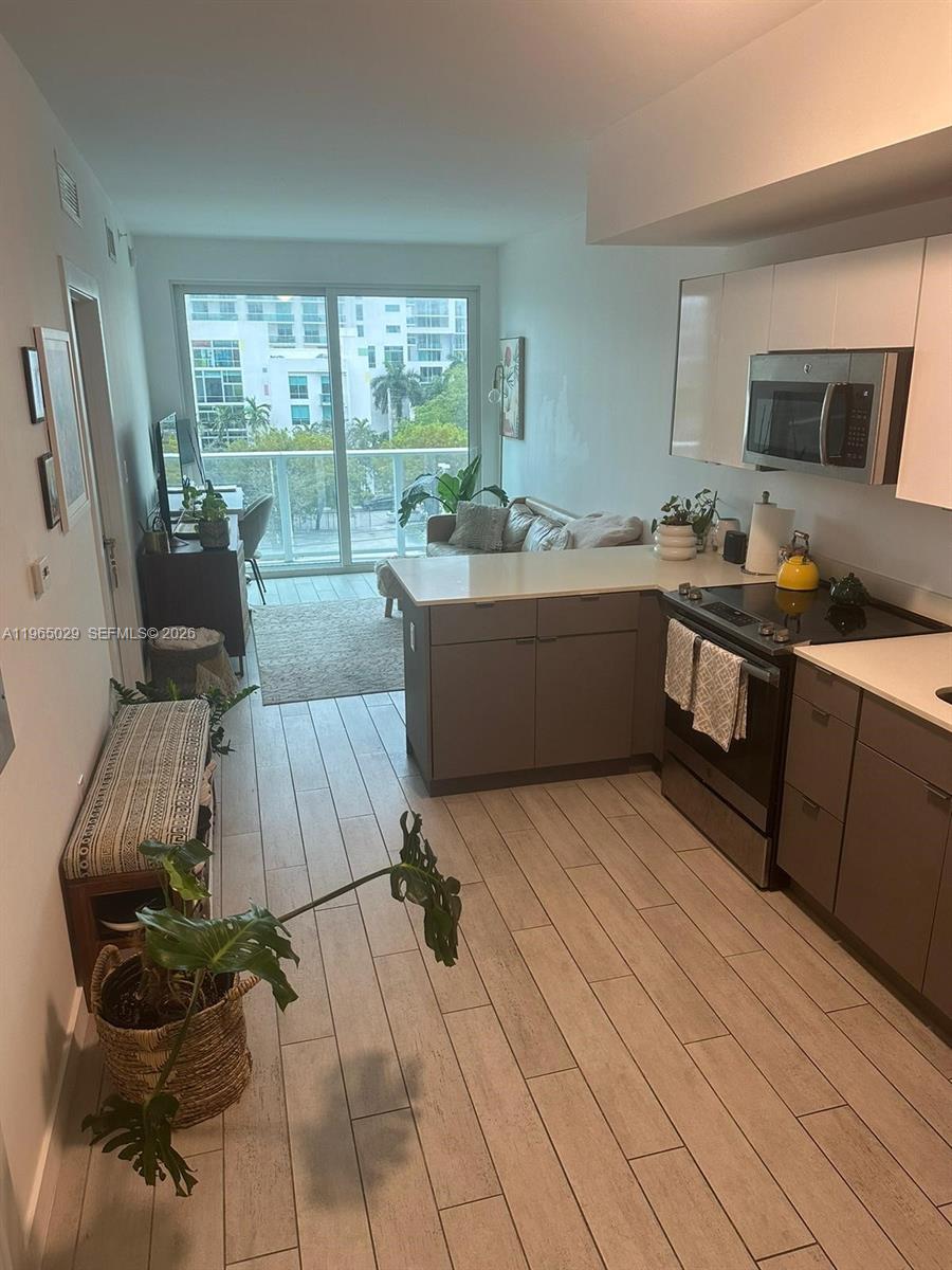 Excellent 1 bedroom unit available at one of the newest luxury condos in the Biscayne strip featuring a super low 26 Edgewater offers stylish kitchens and bathrooms with a superb urban location steps away from Wynwood, Midtown and Design district. The building also offers excellent amenities like a gym, a clubhouse, a rooftop pool, and a soon to be open all-inclusive office complex. Wont last, we can offer quick condo association approval for qualified applicants. Please call listing agent for showings.