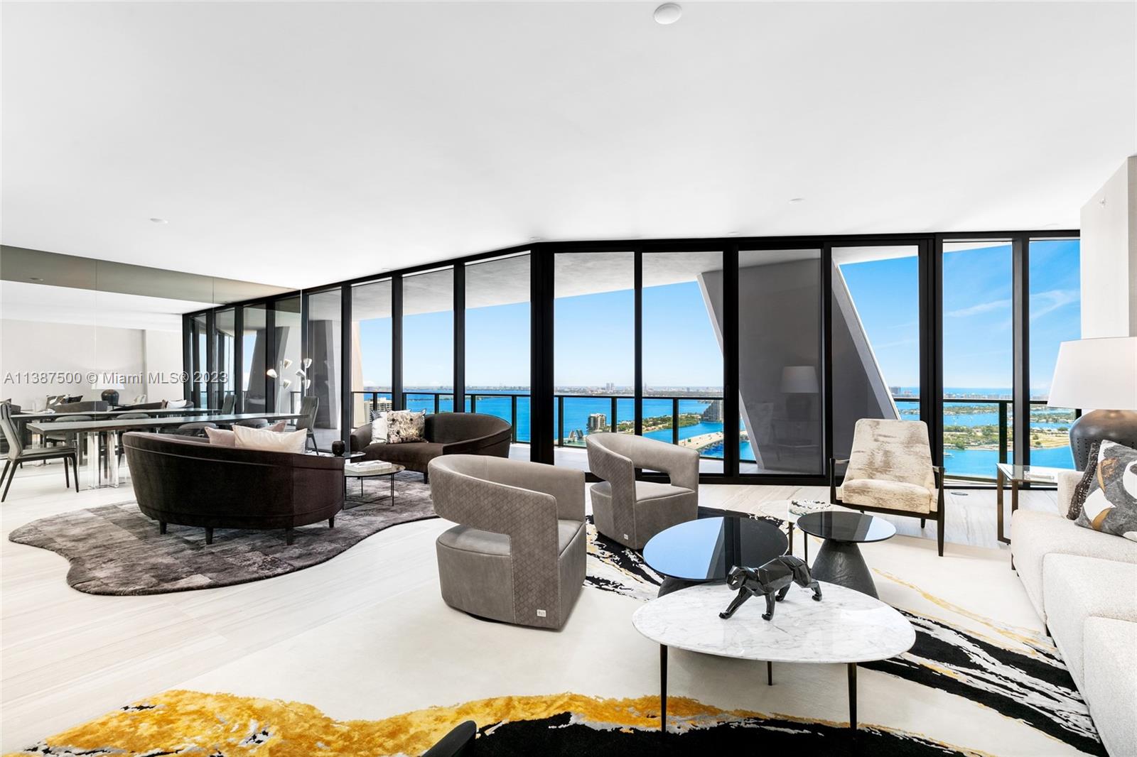 Discover One Thousand Museum by Zaha Hadid, Miami’s pinnacle of refined living. This prestigious tower blends art and architecture to create a truly unique living experience. Enjoy unparalleled luxury with 4 bedrooms plus service quarters, along with 5.5 bathrooms. Distinguishing itself from other units in the building, this home showcases a separate living space and a fully equipped kitchen. Experience meticulous craftsmanship, custom closets, and exquisite porcelain floors. Elevate your lifestyle with Apure & Lutron lighting and a cutting-edge Creston system. With stunning marble walls and a wall-mounted TV, this home epitomizes a convergence of art, architecture, and Miami opulence.