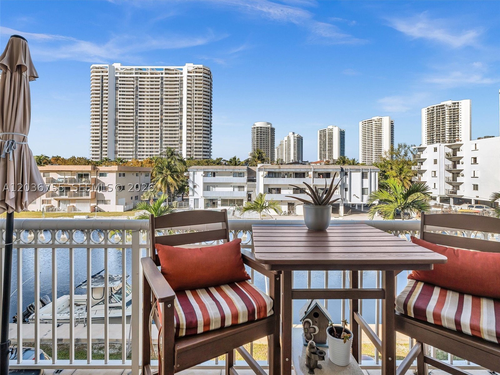 CORNER UNIT AND DOCK SPACE!!!! Gorgeous is an understatement! Move-in ready 2-bedroom, waterfront condo located in the exclusive Eastern Shores community, just off the Intracoastal Waterway. The unit is very bright and offers spectacular water views from a spacious private balcony and a generous living area. DOCK UP TO 30 Feet!!!! The building features a common dock for the exclusive use of homeowners, with dockage available for boats up to 30 feet . Enjoy direct ocean access with no fixed bridges and deep water—ideal for boating enthusiasts. Building has completed the 40 year and 50 year recertification! Additional highlights include a 24/7 guard-gated community, assigned parking space. Well-maintained building with on-site management, pool, BBQ area, party room, welcoming lobby, elevator, and security cameras. Conveniently located near shopping, dining, and entertainment. Situated on the west side of NE 35th Avenue, with the condo directly on the water to the east. An ideal opportunity for a primary residence, second home, or investment property in a prime waterfront​​‌​​​​‌​‌​​​‌‌​​​‌‌‌​​‌​​‌‌​​​​ location.