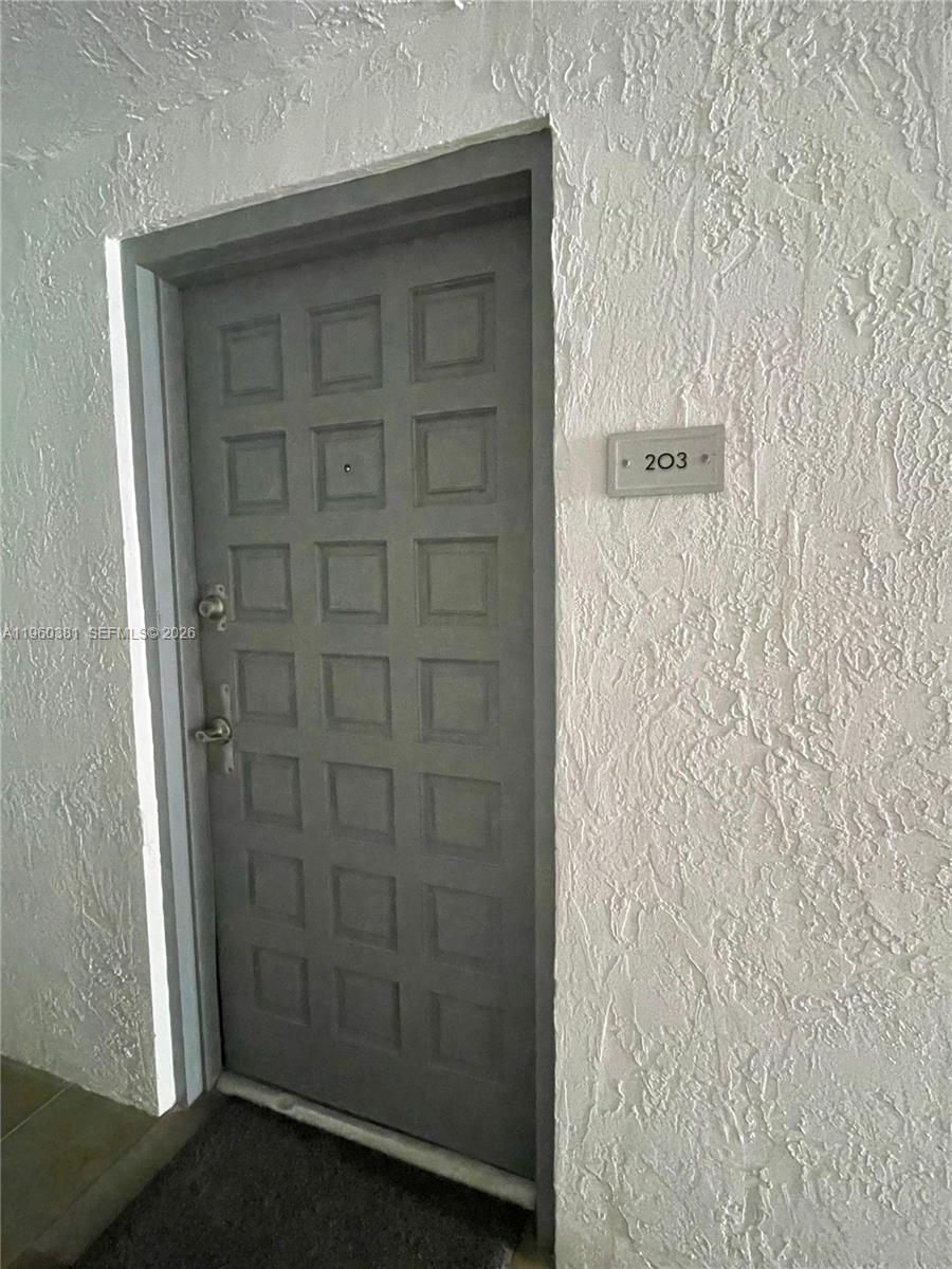 All impact windows and sliding doors. (One parking space with the unit & Additional parking space for $25 a month). Beautiful private community at Nirvana with bay-front infinity pool, lap pool and a jacuzzi. Private beach area w/ volleyball court. Bbq area, gym, steam room, dog walking areas, 24 hour security and beautiful landscaping. Farmer market and Yoga.