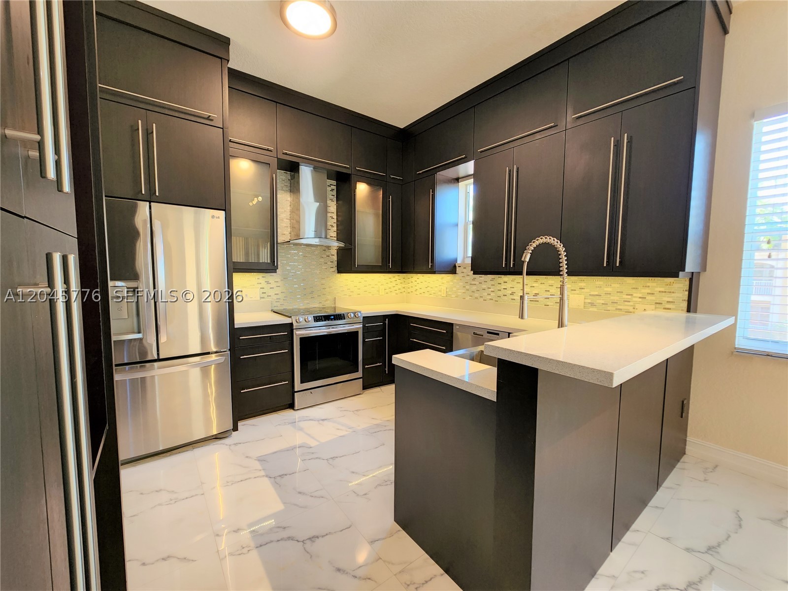 Beautifully remodeled 3-bedroom, 2-bath condo! This move-in-ready home features stainless steel appliances, an updated kitchen with quartz countertops, premium finishes, and abundant cabinet space. Both bathrooms have been fully remodeled, and each bedroom offers custom closets. Freshly painted throughout. Enjoy resort-style living in a gated, guard-gated community with a pool, fitness center, playground, and more. The unit includes two assigned parking spaces. First month's rent, last month's rent, and security deposit required for move-in. Water is not included. A minimum 720 credit score is required by the HOA.