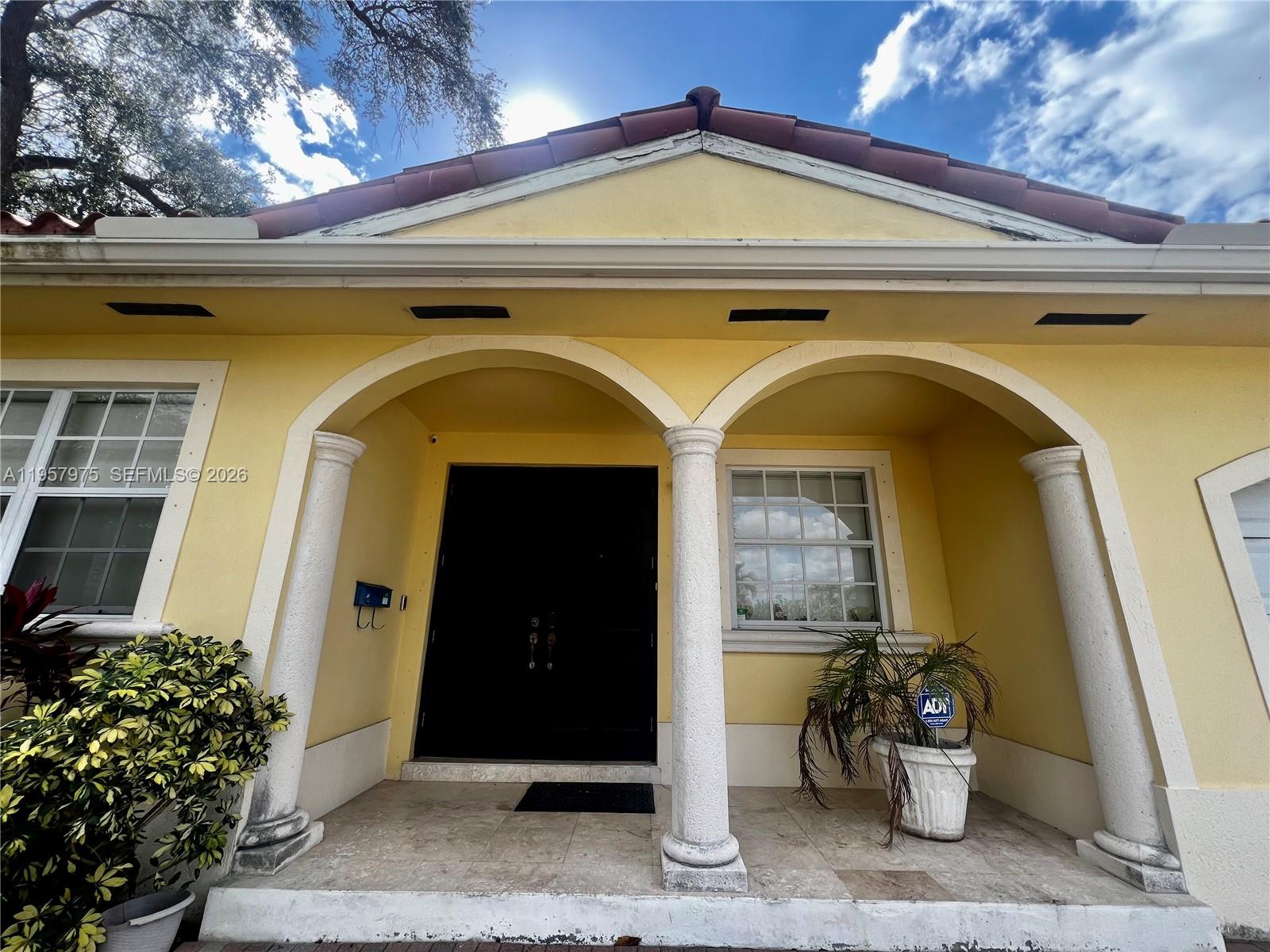 ADJUSTED PRICE!!! Great opportunity and great location! This single family house, built in 2003, features 3 bedrooms, 2 full bathrooms, travertine marble floors, 14 ft ceilings, granite kitchen countertops, stainless steel appliances, new fridge, double sink in the master bathroom. One car garage and a shed with custom generator hook up to the electric panel capable of powering 110v equipment.The house is surrounded by a nice fenced garden for total privacy. Some photos have been virtually staged/decluttered to illustrate home's potential.A must see! Easy to show! Please text listing agent.MOTIVATED SELLER.