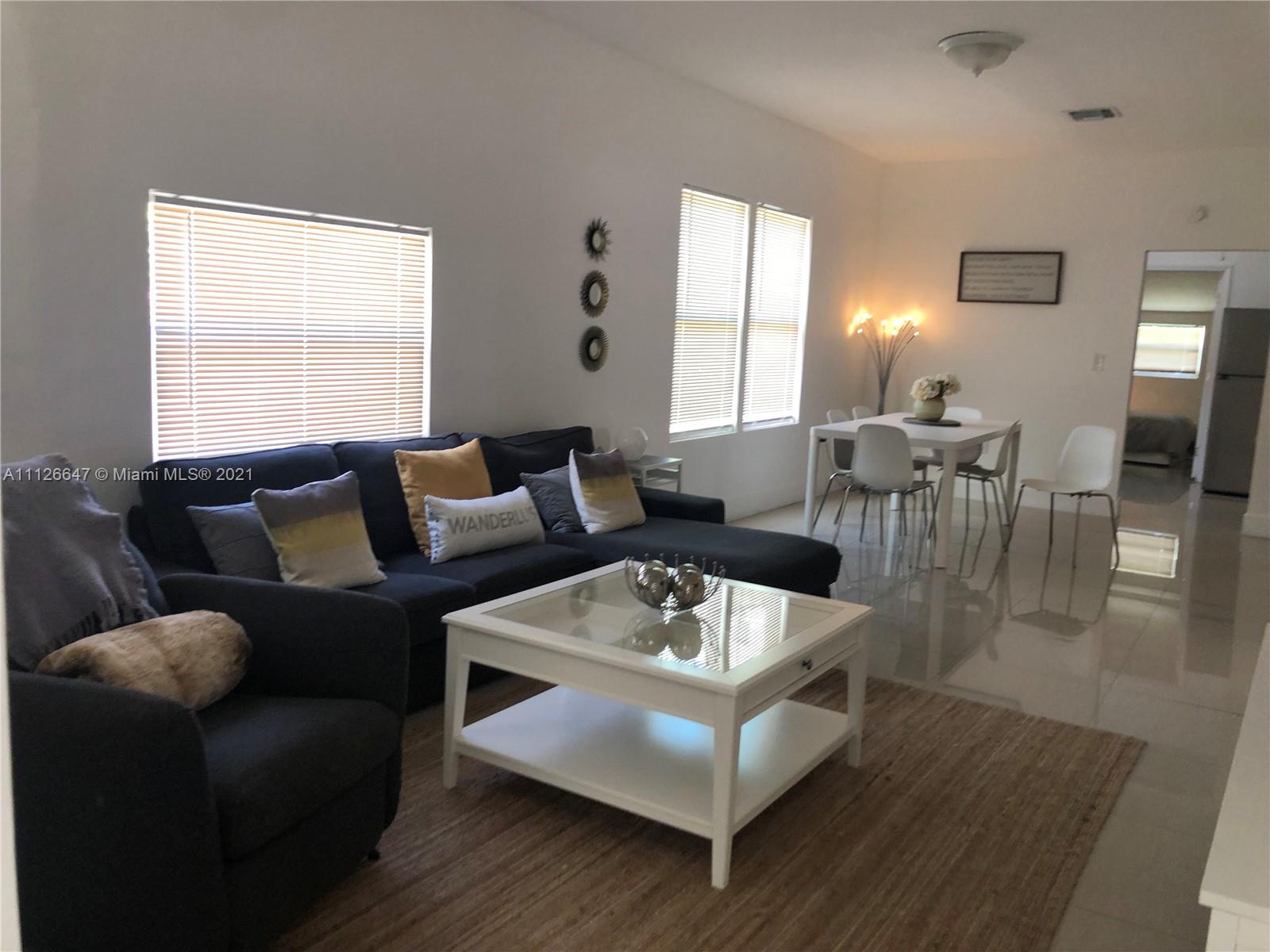 Totally remodeled house with tile floors updated kitchen with SS appliances, washer and dryer, updated bathrooms, 2 large bedrooms plus den, foyer. large yard gated and ample parking. ideal for a family located in the heart of Little Habana west of Miami Financial District, Brickell, Bay Front Park and Coral Gables.