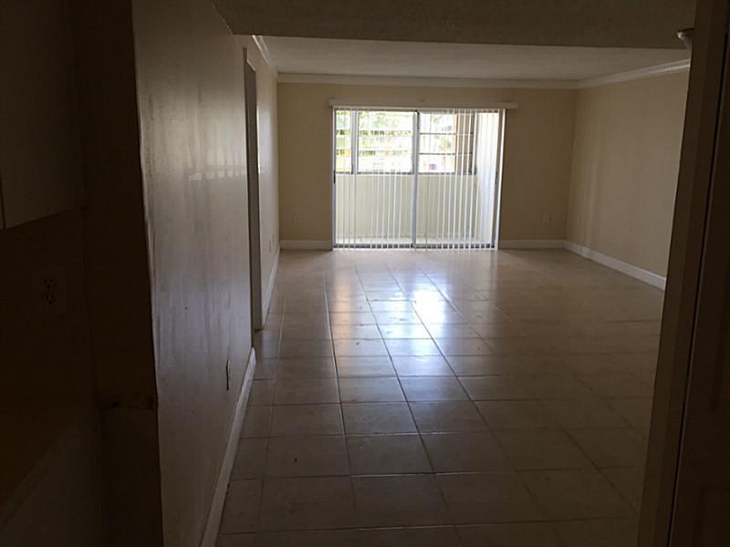 BEAUTIFUL SPACIOUS 3 bedroom, 2 bathroom unit. Recently Remodeled with Stove, Fridge, Dishwasher and Microwave. This is a spacious unit , very clean with tile floors through out the unit. LARGE rooms with walk in closets. CENTRALLY located and the communi ty offers a pool and an exercise room.