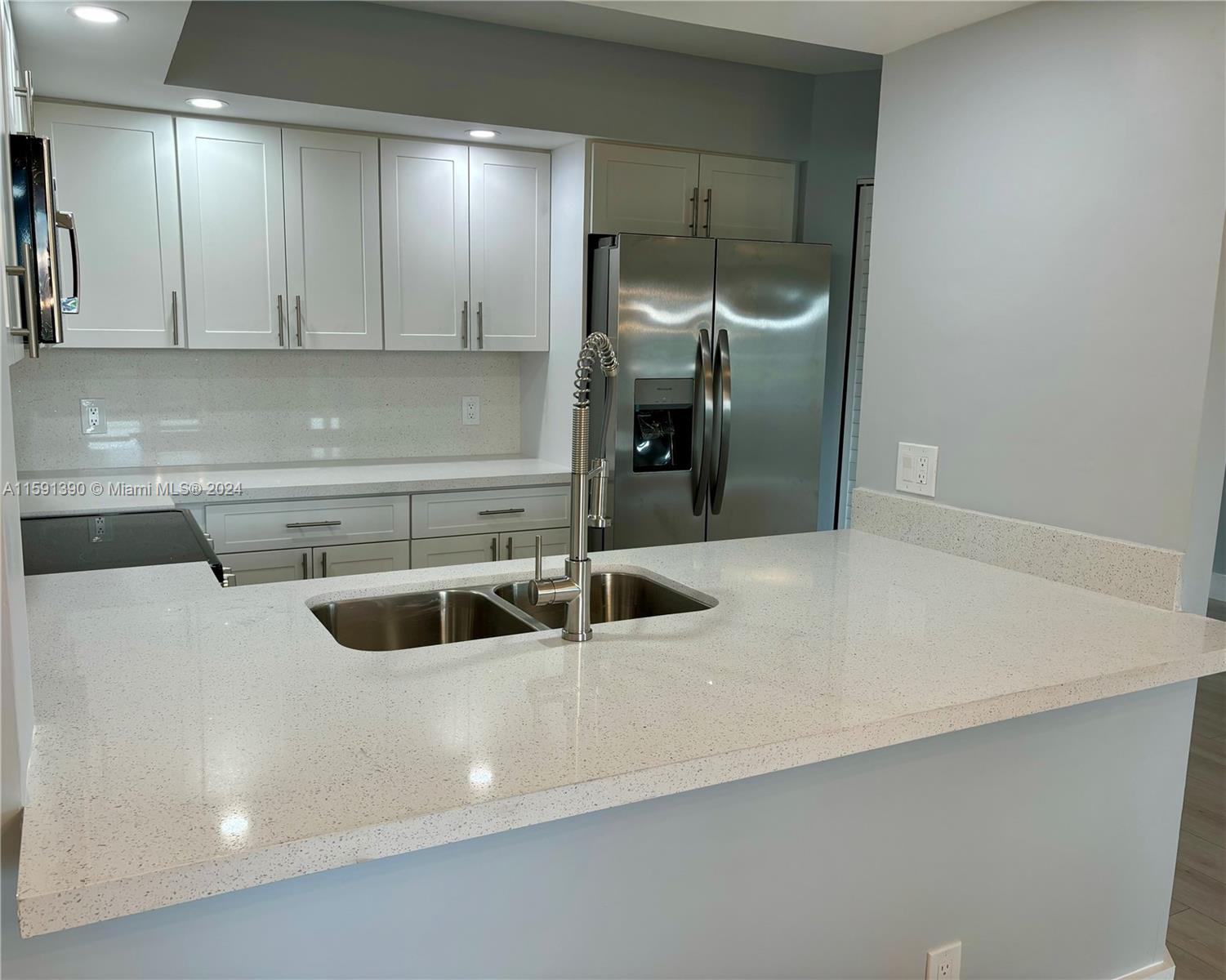 Completely remodeled 1 Bedrm /1.5 bath, first floor unit. This is a must see! Everything is BRAND new. New flooring through-out, new kitchen cabinets with granite counter-tops & stainless-steel appliances. Both bathrooms completely done as well. Also new lighting, closets, A/C unit, water heater and Washer & Dryer. Unit has plenty of natural lighting with views of the golf course. Plus, balcony enclosed with impact slide door. Hoa fees include water, cable and internet. Community has much to offer such as golf, pools, tennis and gyms. As well as entertainment activities in the Clubhouse, restaurants, medical facilities, transportation and much more! Community requires a 650+ credit score. One person must be 55 or over to reside.