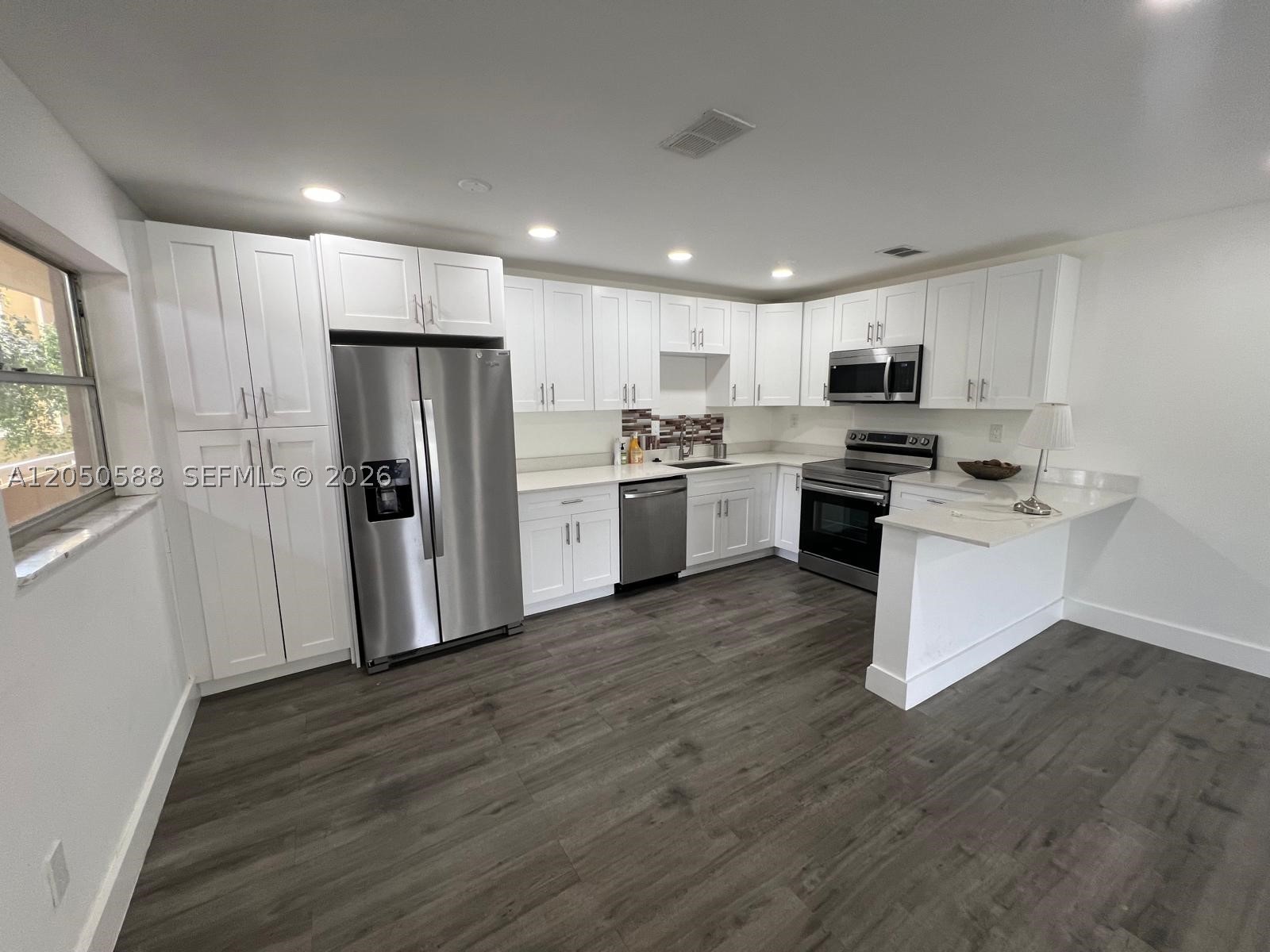 Beautiful Corner unit, 2 bedroom 2 bathrooms with 2 balconies. Laminate flooring throughout, wood  withe cabinets in kitchen, stainless steel appliances, and granite counter tops.  The unit is completely updated. The Community has 2 pools, bbq area and fenced in open court. Centrally located close to major highways.  It is  just minutes away from numerous plazas and casinos, trendy shopping, beautiful parks, convenient transportation, and in the vicinity of major highways, such as, I-95, I-75, Turnpike and the 595. Water, garbage and sewer are included in the rent. Come to see it and make it your home.