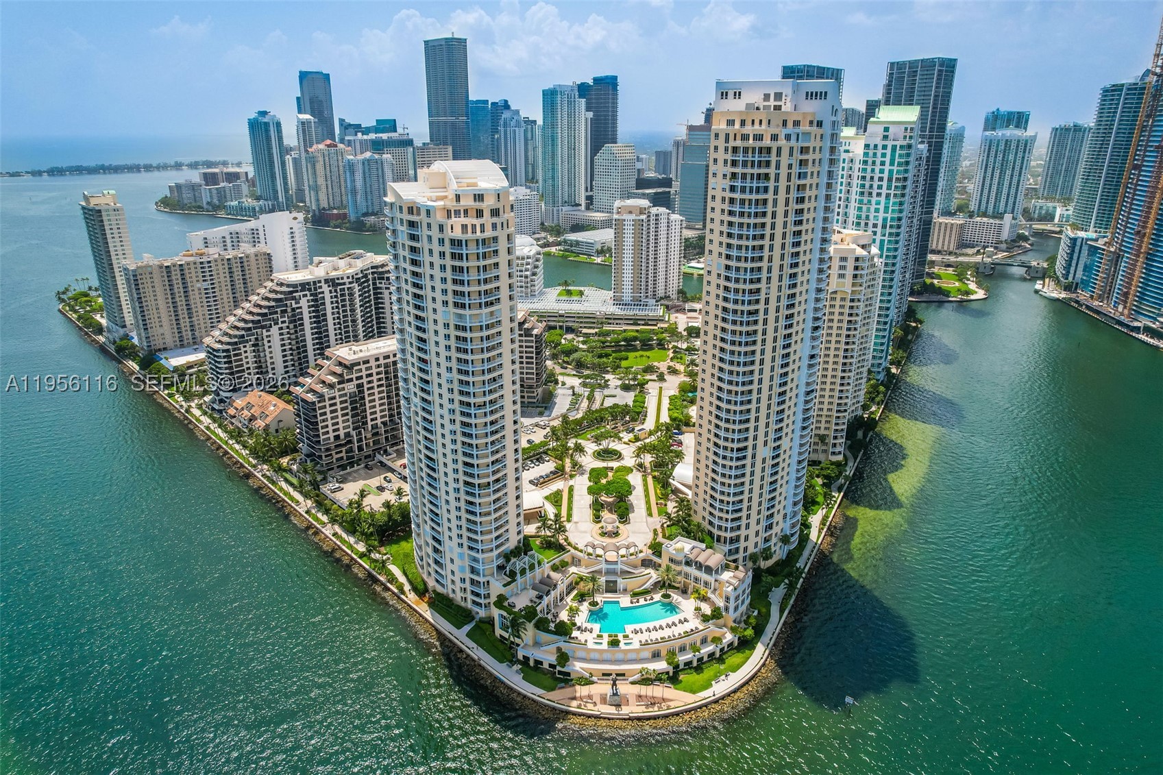 Spectacular Corner Residence on Brickell Key Island, great investment opportunity
An exceptional corner residence offering breathtaking panoramic views of Biscayne Bay and the Miami skyline from two expansive balconies—perfect for sunrise mornings and sunset evenings.

This elegant 2-bedroom, 2.5-bath + den (convertible to additional sleeping quarters) home spans 1,884 SF and offers a gracious layout with a true home-like feel. It features a bright, open floor plan with marble floors throughout, generous living and dining spaces, and a refined split-bedroom design. Beautifully updated baths and six floor-to-ceiling custom closets provide both style and exceptional storage, complemented by built-in desks in each bedroom.

Set within the exclusive gated enclave of Brickell Key, a guard-gated island with additional controlled access to the building. Residents enjoy resort-caliber amenities including an oceanfront pool and spa, two-level fitness center, tennis, racquetball, yoga and CrossFit studios, as well as elegant entertaining and conference spaces. A rare opportunity offering stunning views, privacy, security, and an unparalleled lifestyle—just moments from the heart of Brickell.