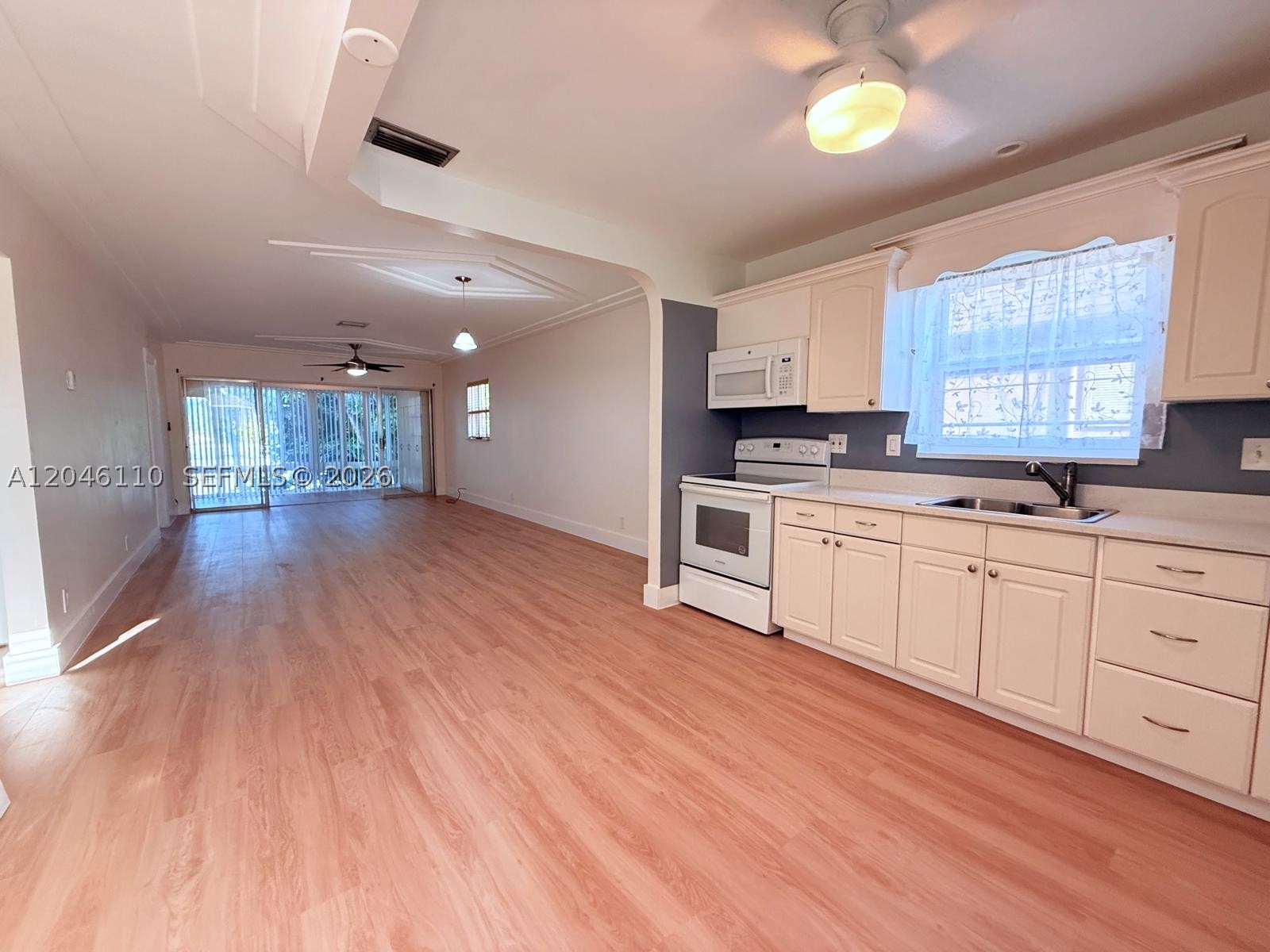 Discover this bright and updated 2-bedroom, 2-bath condo in the heart of Hollywood, offering a clean, move-in-ready interior and excellent rental flexibility. The unit features brand-new flooring throughout, a new water heater, spacious living areas filled with natural light, and a functional kitchen with white cabinetry, ample storage, and a comfortable layout. Both bedrooms offer generous space, ceiling fans, and large closets, including a walk-in closet with custom shelving. The bathrooms are well-maintained, with modern tile work and updated vanities.

This home is ideal for first-time buyers seeking a solid, well-kept property, and equally attractive for investors: the community allows immediate rentals, either annual leases or two rentals per year, creating a strong income-producing opportunity. The building offers a quiet environment, green areas, a pool, and convenient access to shopping, dining, major highways, Downtown Hollywood, and the beaches.

Seller is open to considering seller financing depending on the case, offering additional flexibility for qualified buyers.

A clean, updated, and versatile property with excellent rental potential — a must-see in this market.