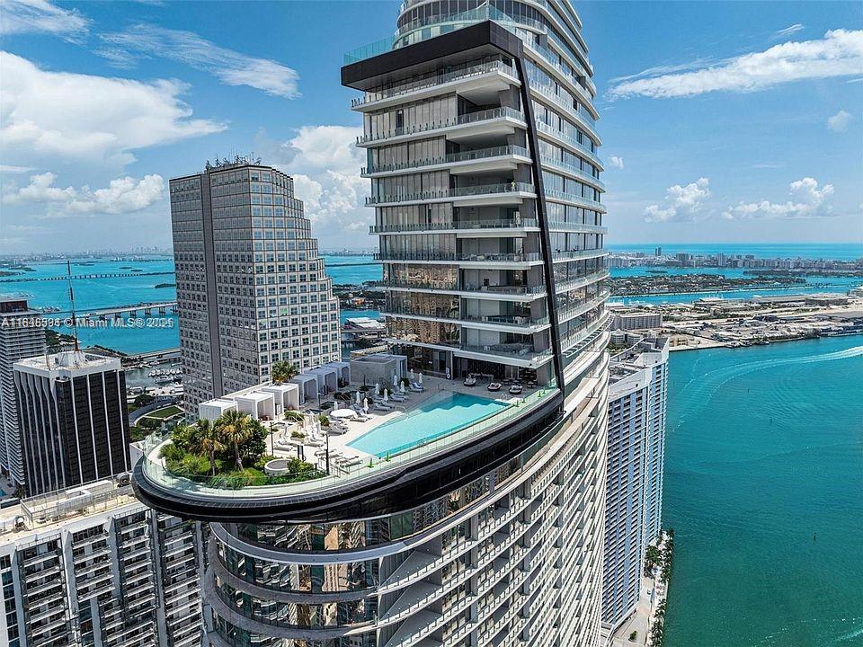 Experience elevated luxury in this 3-bedroom, 3.5-bath residence at Aston Martin Residences, Miami’s most iconic waterfront tower.
Perched on the 47th floor, enjoy panoramic views of Biscayne Bay through floor-to-ceiling glass walls.
Featuring an open-concept layout, Italian cabinetry, Gaggenau appliances, and a private terrace.
Includes 2 garage spaces, exclusive amenities, and legendary Aston Martin design in every detail.