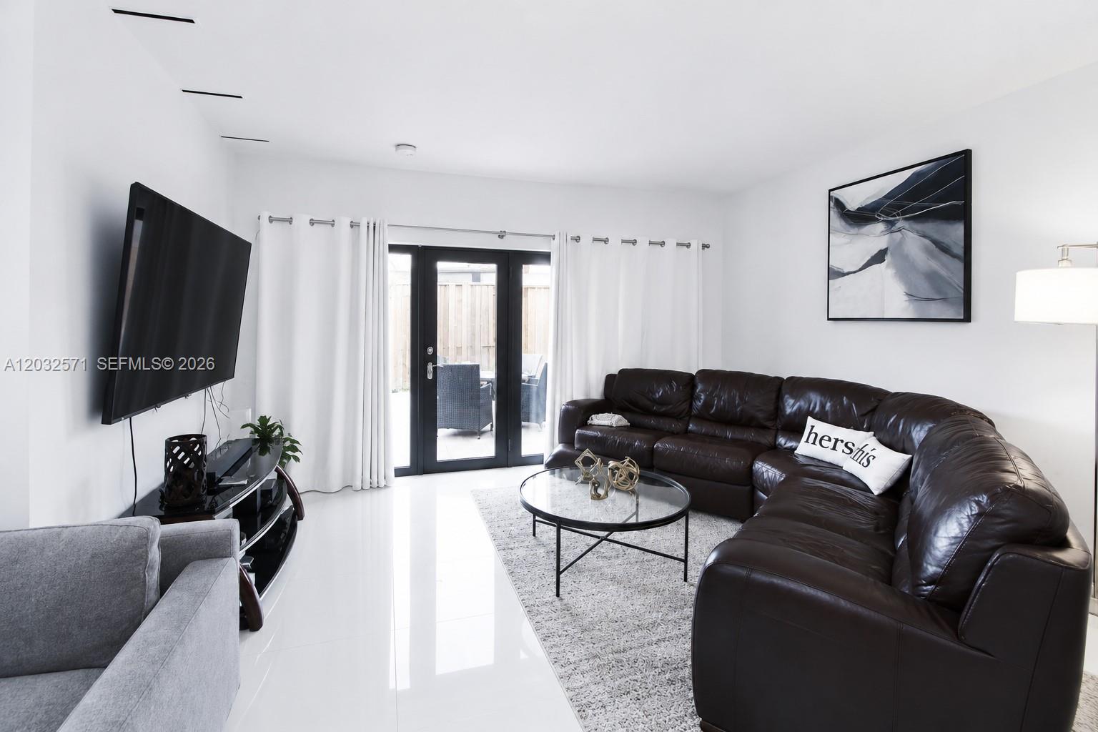TAMIAMI LAKES TOWNHOUSES - Residential