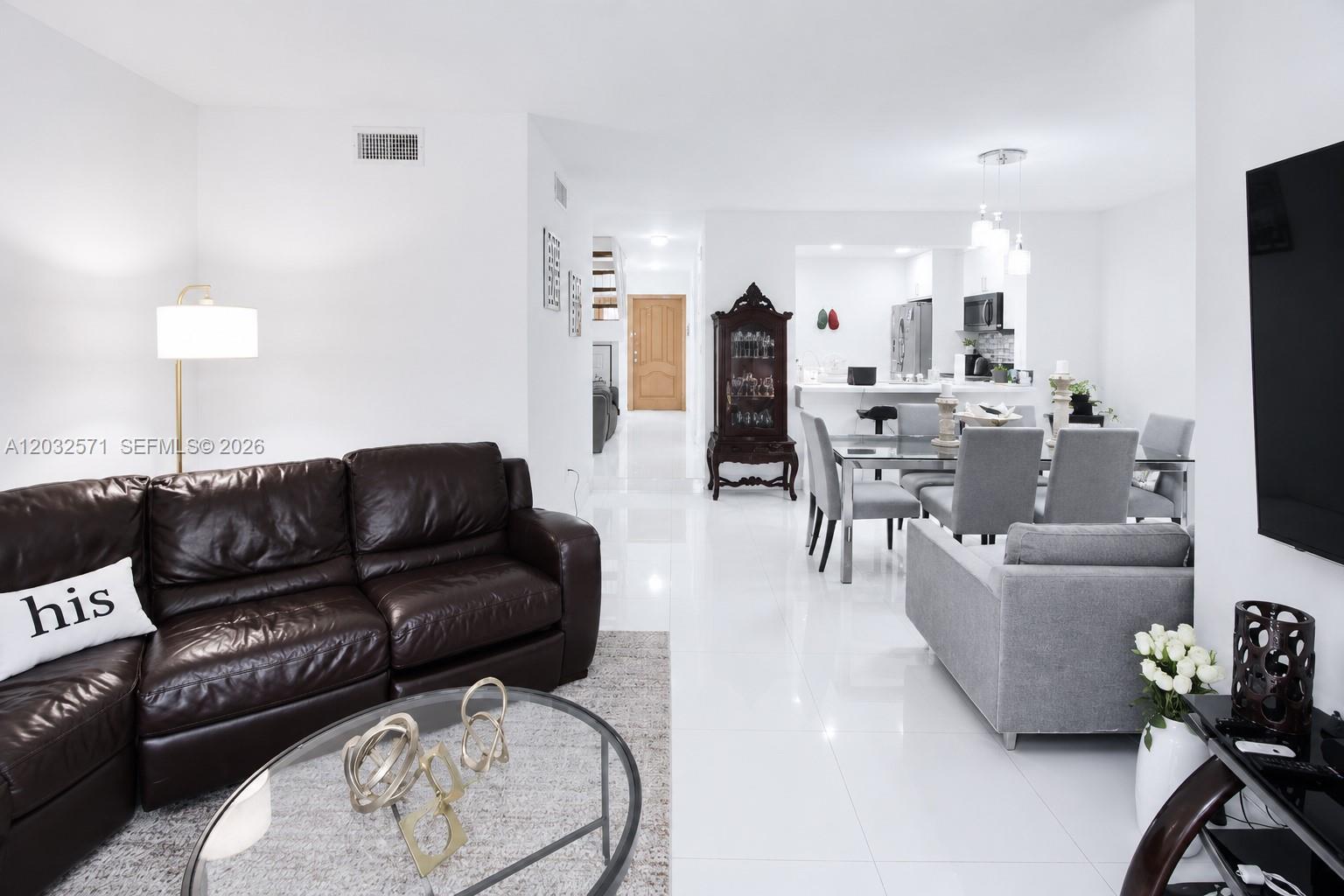 TAMIAMI LAKES TOWNHOUSES - Residential
