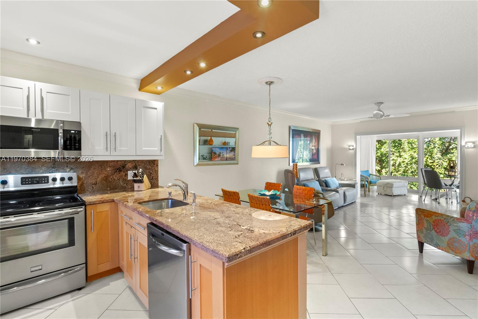 Experience effortless luxury in this stunning 2-bed, 2-bath condo, tailored for active seniors! Nestled in the heart of Lauderdale Lakes, this fully remodeled retreat offers serene lake views and top-notch finishes. The open-plan living area flows seamlessly into the spacious dining and kitchen spaces, perfect for entertaining or enjoying quiet moments. The master suite boasts a walk-in closet and modern en-suite bathroom.Enjoy resort-style living with access to a vibrant clubhouse, sparkling pools, BBQ area, and social activities. Take advantage of the beautifully maintained grounds, complete with walking paths and scenic views. With impact windows, a remodeled interior, and a prime location near shopping, dining, and healthcare, this condo is the perfect blend of comfort, style, and convenience. 

Key features include:
- 2 spacious bedrooms and 2 modern bathrooms
- Completely remodeled with high-quality finishes throughout
- Impact windows for safety, energy efficiency, and peace of mind
- Stunning lake view that brings tranquility to your daily life
- Resort-style amenities and social activities designed for active adults
- Prime location in Lauderdale Lakes, close to everything you need
- 2022 AC and Tankless Water Heater
