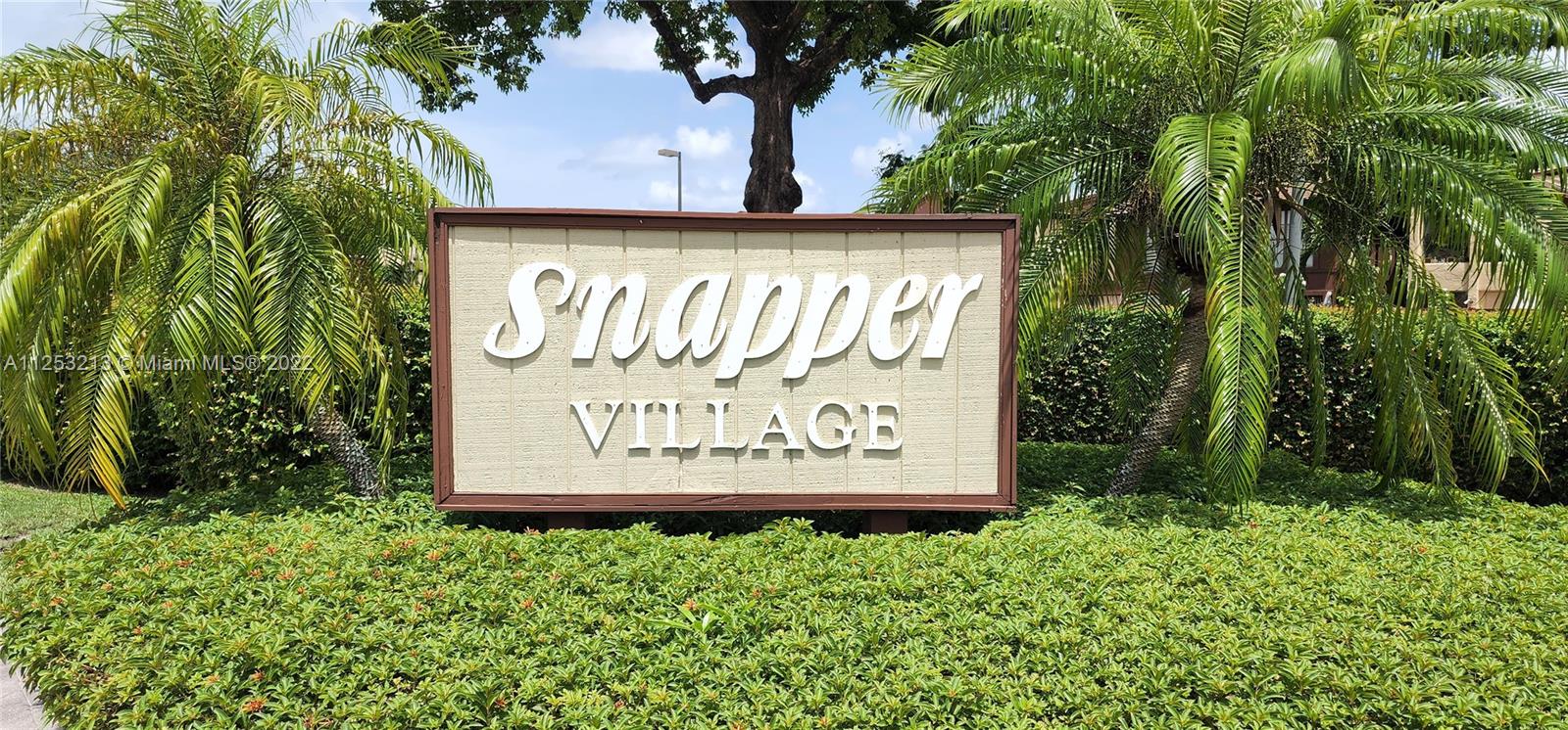 Spacious and fully renovated 3/2.5 two story corner townhouse in the desirable. guard-gated Snapper Village Community.  Totally remodeled in 2020, up to 4 parking spaces, 1 assigned, 3 guest parking (with decals).  Gorgeous resort style pool, 3 tennis courts, children's playground, and 24/7 security.  Unit has a gas range and water heater, stainless steel appliances, huge master bedroom with 2 walk-in closets, and largest wrap around patio in the community!