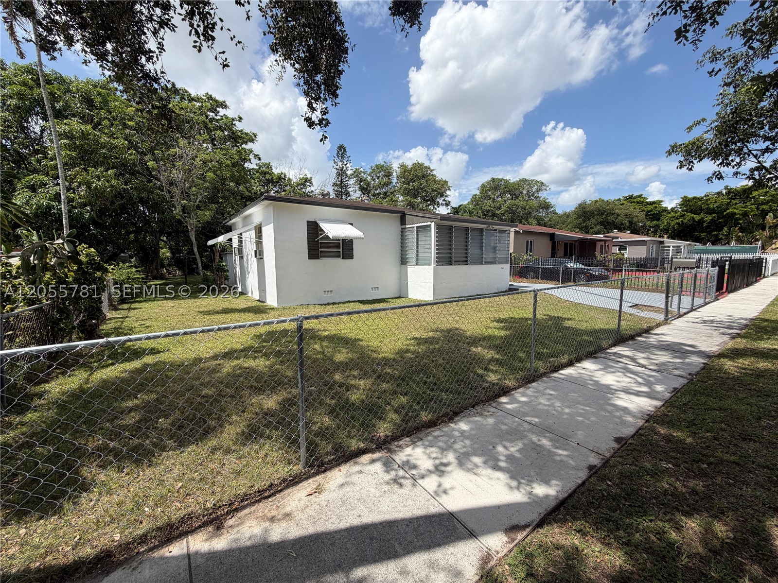 Charming 2-bedroom, 1-bath single-family home featuring a covered front patio, spacious backyard, and a fully gated lot. The property offers a private driveway with ample off-street parking and a functional floor plan with comfortable living spaces and abundant natural light. The oversized backyard provides endless possibilities for entertaining, gardening, play, or future customization. Conveniently located with quick access to major roadways, shopping, dining, and schools, this home is an excellent opportunity for homeowners and investors alike. Schedule your private showing today!