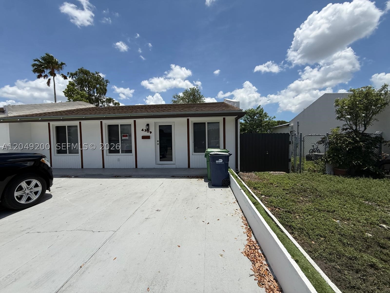 Move-in ready!  This charming home features 3 bedrooms and 2 bathrooms, impact windows, and comfortable living spaces perfect for enjoying with family. With no HOA, you’ll have the freedom and peace of mind you’re looking for. Enjoy a beautiful water view from the backyard, overlooking a canal that, with its wide and scenic appearance, feels like a small lake.  A wonderful opportunity to make this your next home! For showing please call Listing Agent.
