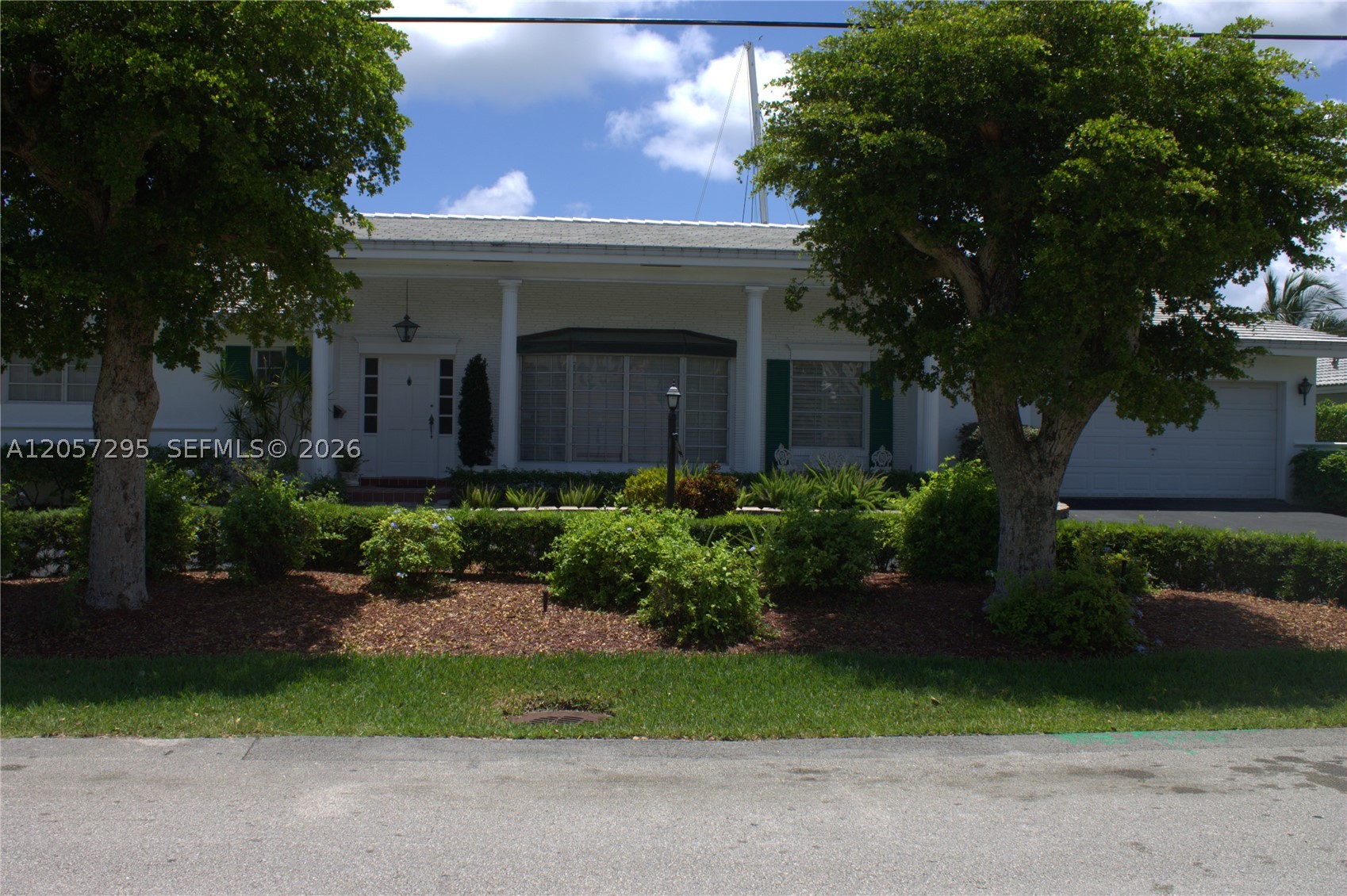 Custom home in gated community of Eastern Shores. Features a split floorplan and new roof of only five years old. Deep water frontage of 64 feet provides a boaters paradise with direct ocean access and no fixed bridges to Haulover Inlet. Rear Southern exposure provides year round sun and predominantly Southeast breeze advantage. Only minutes drive from the beach as well as renouned Aventura Mall and Bal Harbour Shops. Oleta state park as well. Bonus of large driveway with ample parking up to eleven cars not including two car garage. Location, Location, Location.
