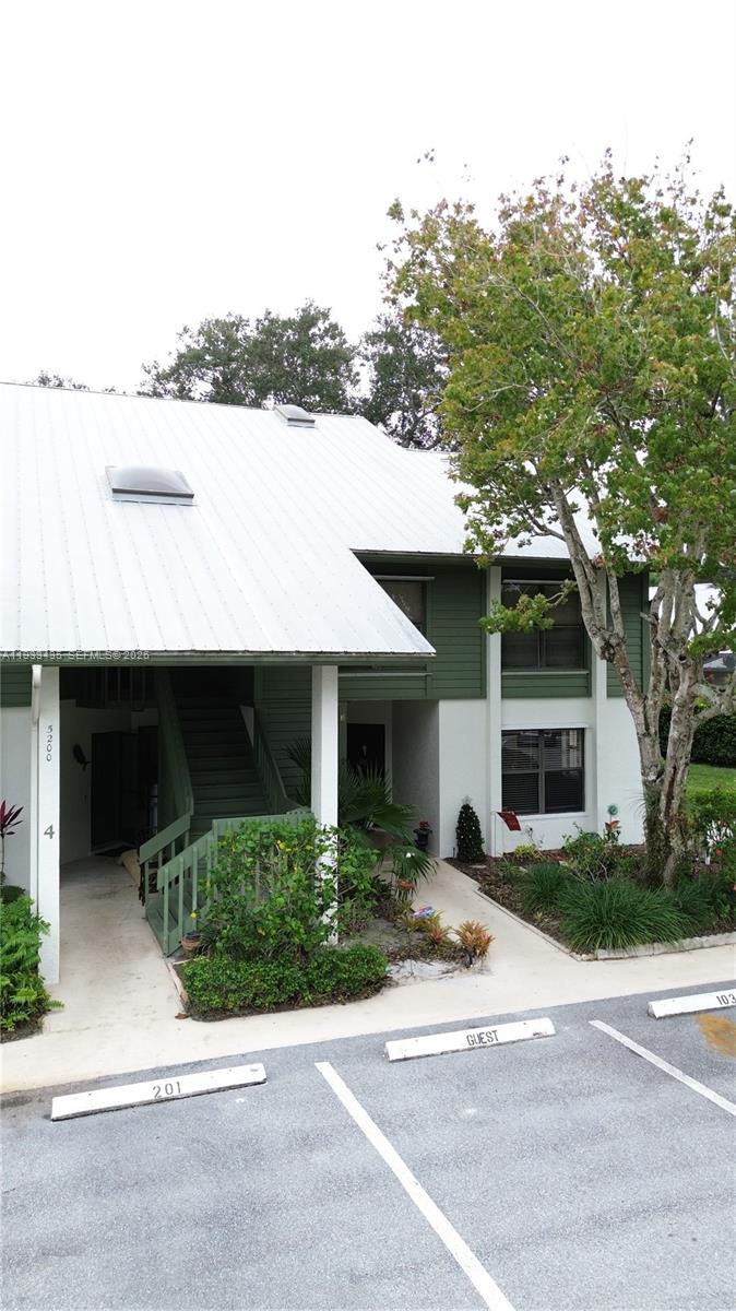JUST PRICED TO MOVE!!  Located on the second floor within the sought-after Seascape community of Rocky Point, this rarely available condo offers a peaceful, tucked-away setting surrounded by mature landscaping and natural shade. Vaulted ceilings and an open, flowing layout create a bright and spacious atmosphere, giving the home a larger, more open feel. Natural light fills the living areas, enhancing the clean lines and comfortable design.

The eat-in kitchen opens seamlessly to the main living space, making it ideal for entertaining or casual day-to-day living. Built-in shelving and plantation shutters add character and function while maintaining a timeless, polished look. The split-bedroom floor plan is thoughtfully designed for privacy, with bedrooms positioned on opposite sides of the unit.

The primary suite features ample closet space and an updated bath, offering a quiet retreat at the end of the day. Step outside to the private screened lanai, an extension of the living space that’s perfect for enjoying morning coffee, evening relaxation, or simply taking in the surrounding greenery. This home presents an excellent opportunity for buyers seeking comfort, privacy, and a desirable Rocky Point location. 
OPEN HOUSE June 7, 2026  11AM-3PM     
JUST PRICED TO MOVE $228,500