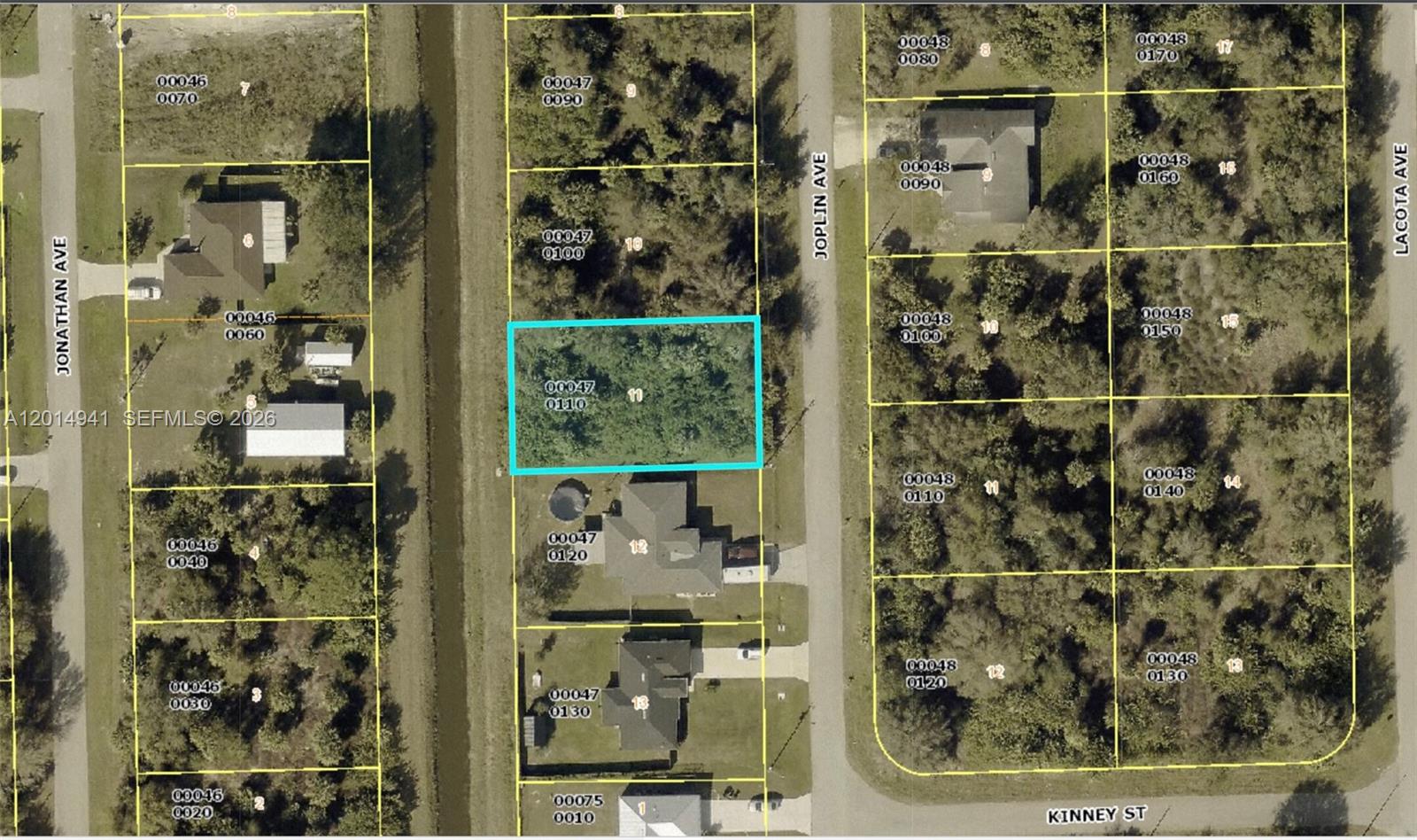 Here is your chance to secure a prime canal-view residential lot in Lehigh Acres, FL — a community experiencing remarkable growth and strong demand from buyers across the country. This parcel on Joplin Avenue backs to a peaceful canal, offering the kind of tranquil water views that make Florida living truly special. Surrounded by existing homes and new construction activity, your future build will enjoy a welcoming neighborhood feel from day one. Close proximity to Lee Boulevard (SR-884) means effortless access to Fort Myers, Cape Coral, and all the shopping, dining, and employment opportunities Southwest Florida has to offer. No deed restrictions and no HOA mean you and your builder call the shots. Utilities are accessible in the area. Lock in your canal-view piece of Lehigh Acres before prices climb further.