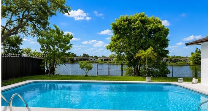 Beautifully remodeled waterfront pool home in Sunrise Golf Village featuring 5 bedrooms and 3 full bathrooms in a spacious one-story 2085 SqFt under air layout with a 2 Car Garage. The bright, open interior showcases a brand-new kitchen with quartz countertops, new appliances and a gas range, along with new tile throughout the main living areas and laminate wood flooring in the bedrooms. All three bathrooms have been remodeled with trending high end styles and fixtures with details that offer spa-like feel. Enjoy the covered patio, private pool, wide water views and an 8,625-square-foot lot—ideal for indoor-outdoor living and entertaining. Conveniently located near shopping, dining, parks and major roadways. No HOA restrictions, park your boat and/or RV.  Hurry this Home will not last long! Open House Saturday 7/11 1-3pm