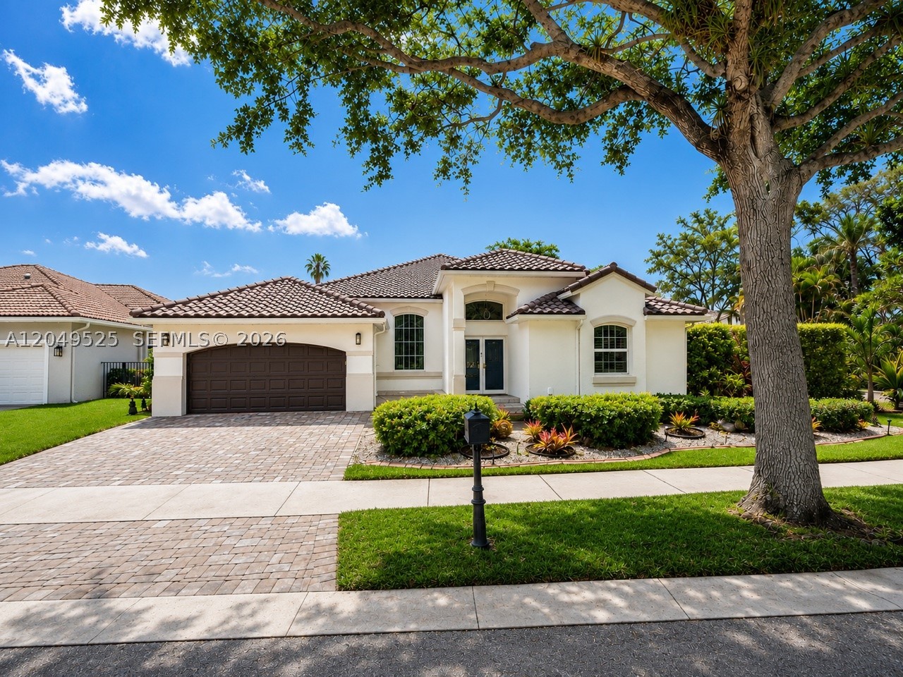 Located in Weston Hills Country Club, freshly painted, vacant and ready to move in!  This beautiful residence offers 5 bedrooms, 3.5 bathrooms, plus a private office. The spacious primary suite features a comfortable sitting area and a beautiful primary bath designed for comfort. This home showcases high-volume ceilings and a brand-new renovated kitchen featuring top-of-the-line appliances, sleek modern cabinetry, a center island, and premium modern countertops — perfect for both everyday living and entertaining. In addition, the home features a spacious great room ideal for use as a hobby room, art studio, playroom, or flexible family space. Step outside to enjoy the pool and a large outdoor area ideal for South Florida living. Situated on an oversized corner lot with more than 13,000 SF, the property offers exceptional space and privacy. C Zoned for A+ rated schools