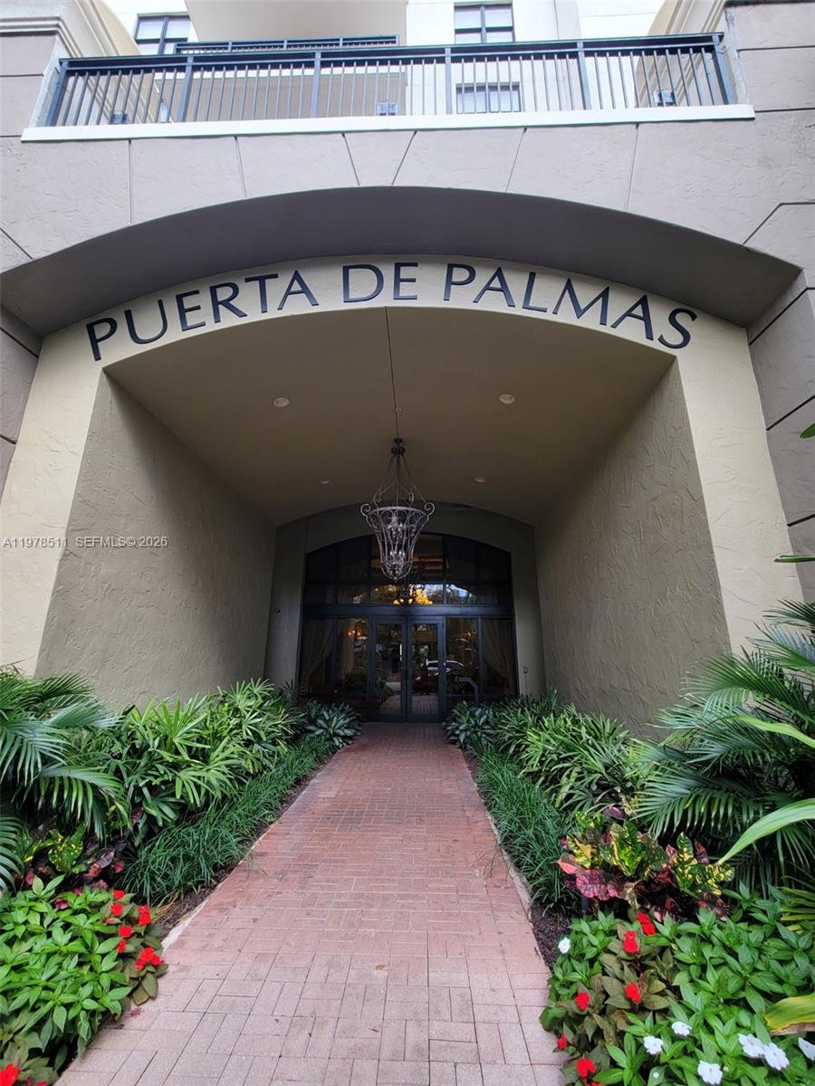 One of the most elegant buildings in the heart of Coral Gables, welcome to Puerta de Palmas! One of the most sought-after buildings in the area, this light filled unit boasts of breathtaking city views and sophisticated interiors.  One of the largest split plan 2 bedroom - 2 bath units in the building, move-in ready for your immediate serene enjoyment. Interior upgrades include impact windows and doors, open concept kitchens with stainless steel appliances and granite countertops, superb custom ceramic tile flooring, custom walk-in closet in the master with an additional large custom closet in the master bedroom as well, new glass shower doors in the baths, jet tub in the master bath, renovated 2nd bath including flooring, remodeled baseboards and door frames, washer/dryer inside the unit. Luxury amenities included  gym, pool, sundeck, putting green, huge recreation room includes bar, kitchen and pool table. Business center with conference, media and library rooms included. Maintenance fee includes cable, internet and water. Centrally located, minutes from restaurants and shopping near Miracle Mile, Merrick Park, Brickell Area, Downtown Miami and Miami International Airport.