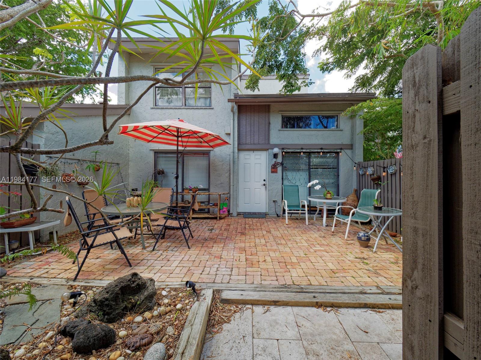 This well-maintained home offers a perfect blend of comfort and efficiency, featuring a newer A/C system approximately 4 years old to keep you cool year-round. The property is equipped with a gas range, gas water heater, and gas dryer, providing both convenience and energy savings. Enjoy added peace of mind with accordion hurricane shutters for quick and easy storm protection. With its functional upgrades and thoughtful features, this home is ready for its next owner to move in and make it their own.