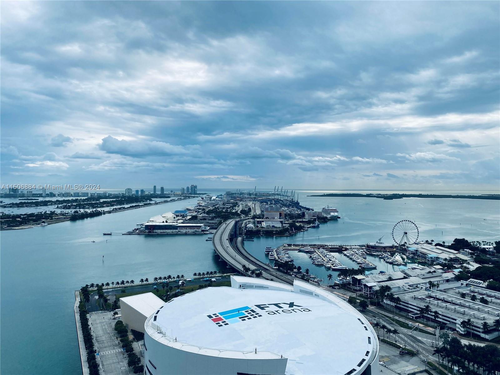 Truly magnificent! Location, Location, Location!!! Sought after residence higher floor at Marina Blue. Absolutely stunning Miami views on -East & West-delivering stunning sunrise, sunset, and unparalleled bay views. 
This fabulous 2/2 Residence features floor-to-ceiling windows & two balconies. Beautiful gourmet kitchen with Island & new refrigerator, oven, microwave stainless steel appliances & granite countertop. Master Bathroom -His and Her Sinks, Roman Tub, Shower Combo & Bidet. 1 assigned parking space + storage. Amazing amenities including practice golf, 2 heated swimming pools, hot tub, fitness center, BBQ area, sand volleyball court, business center, 24-hr concierge & valet parking. Pets ok. Walk to concerts, shows, Heat games!!
