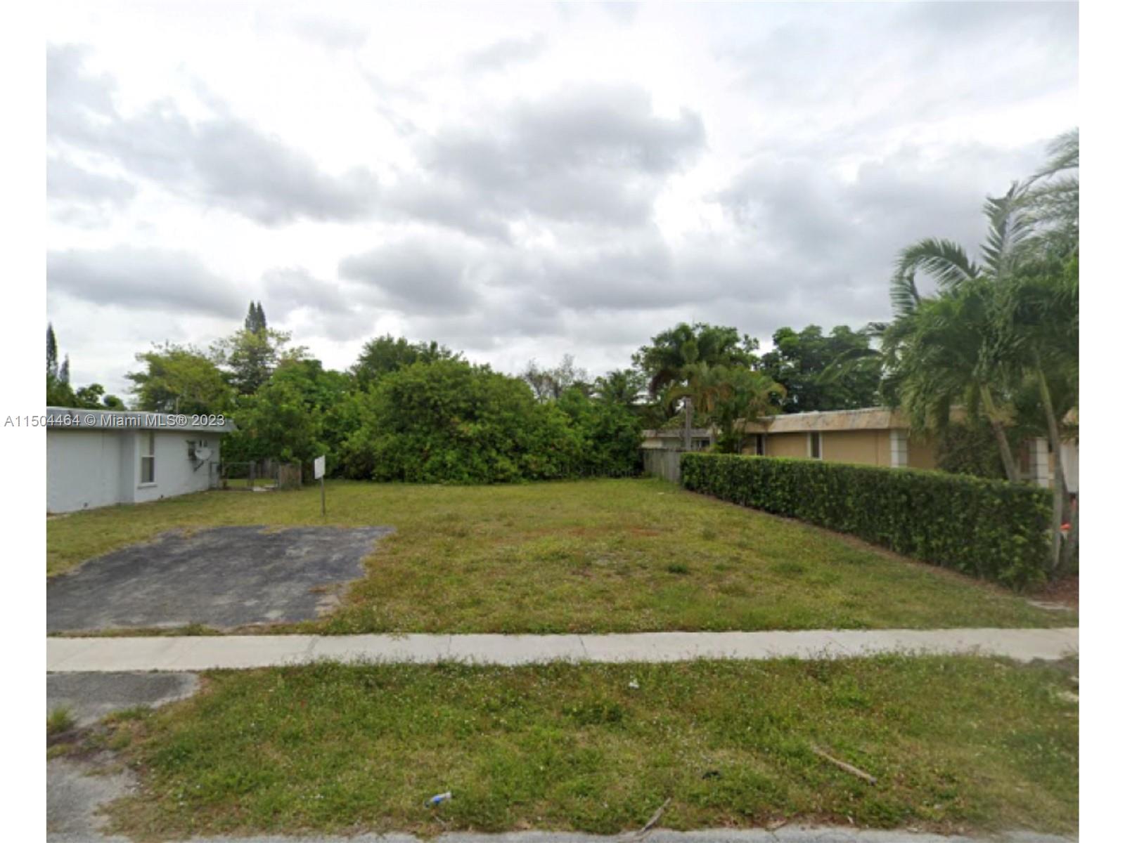 Offering a prime investment opportunity, this 6,000 sqft vacant lot in Tamarac, FL, represents a lucrative prospect for builders and developers. Situated in a well-established area of Broward County, the property offers substantial space for a high-end residential project or a bespoke development. With its strategic location, the lot benefits from proximity to essential amenities, thriving communities, and major thoroughfares, ensuring easy access and desirability. This is an exceptional chance to capitalize on the region's continuous growth and demand for premium housing. A sound investment, this plot is ideal for those looking to expand their portfolio in a vibrant and flourishing market.
