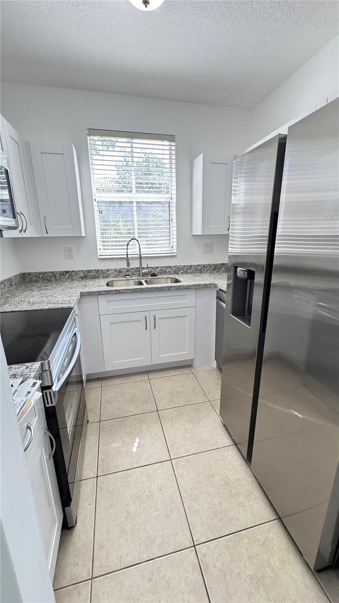 ANCHORAGE AT MIAMI LAKES - Residential Lease