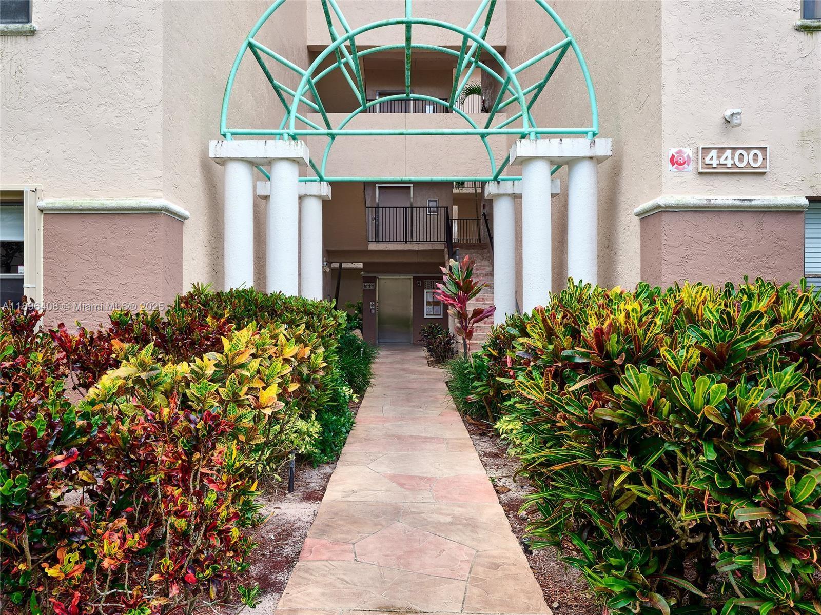 Beautiful 3-bedroom, 2-bath condo in the desirable Township community of Coconut Creek! Spacious 1,392 sq ft unit featuring an open floor plan, updated kitchen, tile flooring throughout, and full-size washer/dryer. Enjoy a private screened balcony with serene lake and garden views. Well-maintained building with elevator and assigned parking. HOA includes water, cable, internet, and full access to Township amenities clubhouse, Olympic-size pool, fitness center, tennis courts, and more. Prime location near Promenade shops, restaurants, and major highways.All ages welcome. Easy to show!