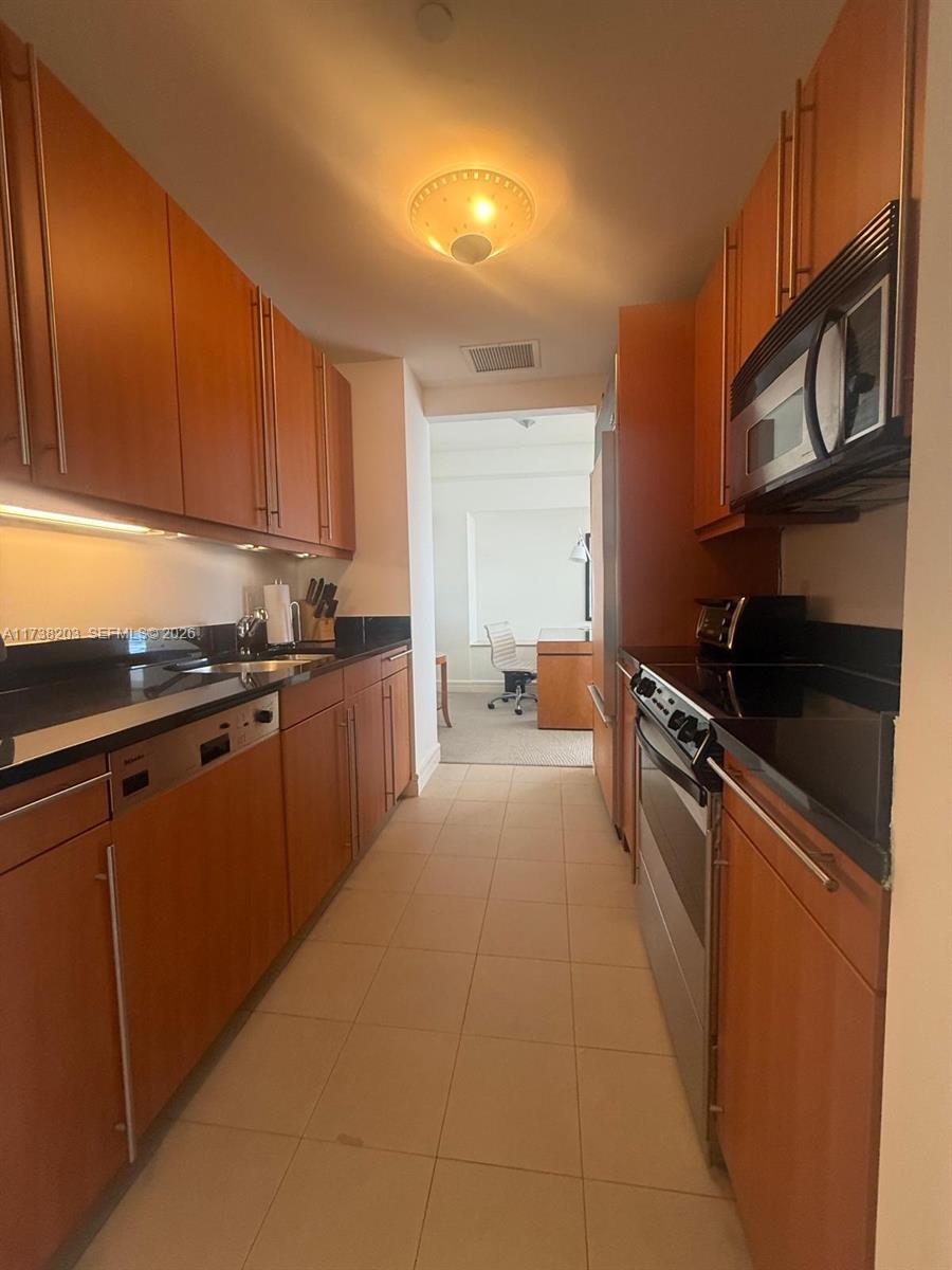 MILLENNIUM TOWER CONDOMIN - Residential