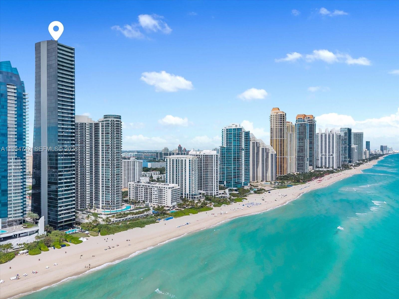 Experience elevated oceanfront living at MUSE Residences Sunny Isles Beach, a visually striking boutique tower born from the first collaboration between renowned designer Carlos Ott and Sieger Suarez Architects. Situated on the 29th floor, this 2,042 SF residence offers 2 BD, 2.5 BA with private elevator access to a dedicated foyer. The open living and dining areas feature volume ceilings, modern linear air diffusers, wide plank baseboards and polished marble floors, flowing seamlessly to an expansive open terrace with sweeping water and city views. The terrace is designed for true resort-style living with marble flooring, alfresco dining and lounge areas, a hot tub, sauna, and a summer kitchen equipped with an Electrichef grill, Sub-Zero mini refrigerator and marble countertops. The chef’s kitchen features a waterfall island, Wolf induction range, dual wall ovens, warming drawers, espresso machine, Sub-Zero refrigeration and wine storage, and dual Asko dishwashers. The primary suite offers terrace access, a custom walk-in closet and a spa-inspired bath with dual marble vanities, Roman tub, double shower and smart toilet. Additional features include wood floors in bedrooms, powder room, laundry room with Electrolux appliances, Duravit fixtures, and Dornbracht faucets. Residents enjoy world-class amenities including an oceanfront pool and spa, beach club, fitness and wellness facilities, concierge services, valet, automated parking, and 24/7 security.