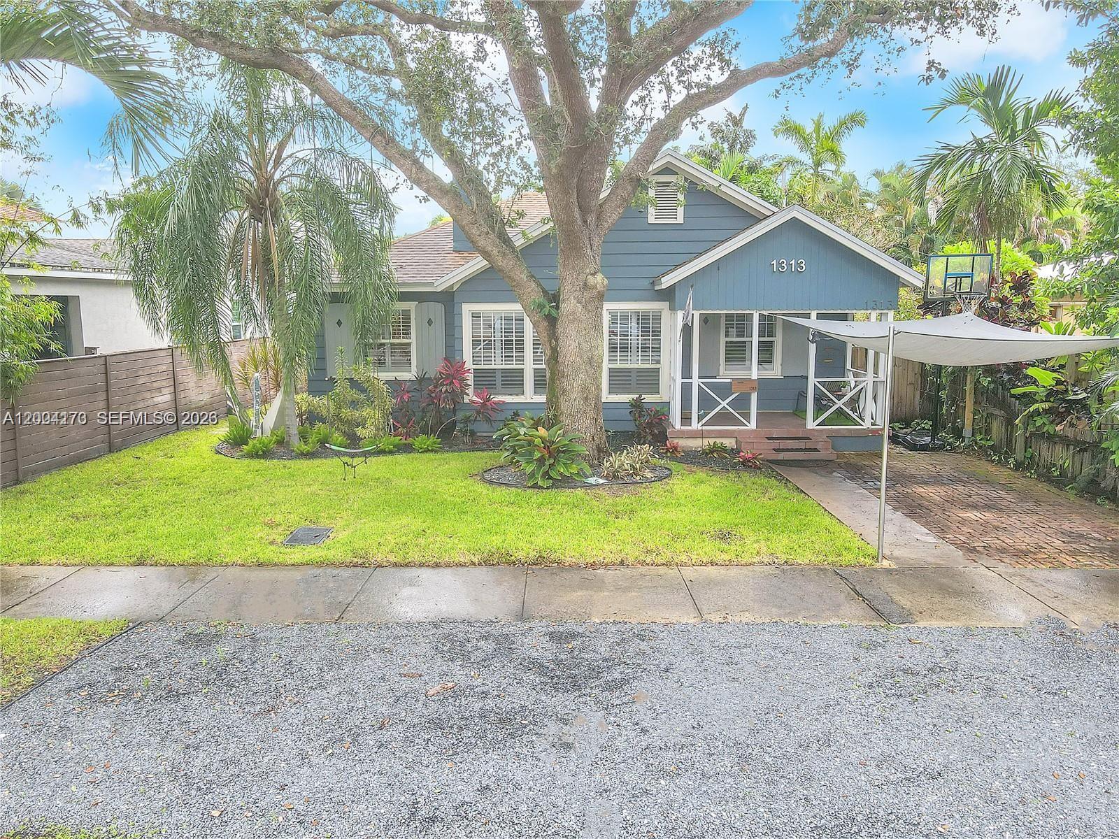 PRICE IMPROVEMENT!!! Beautifully remodeled Turnkey home in the heart of Victoria Park, just minutes from vibrant Las Olas Blvd. This charming residence offers 4 bedrooms and 3 full bathrooms, blending modern updates with timeless Southern character. The home features hurricane impact windows and doors, a newer roof and a thoughtfully updated kitchen and bathrooms. Inside, you’ll find stunning wood floors and a striking vaulted ceiling with exposed wood beams that create a warm, inviting living space. A cozy fireplace adds to the home’s charm, while granite countertops and direct access to a screened-in porch make the kitchen perfect for both everyday living and entertaining. Step outside to your private oasis—an expansive, lushly landscaped backyard complete with a gas heated pool and spa. The fenced yard offers both privacy and plenty of space to relax or host guests. A separate in-law suite with private rear alley access provides flexible living options, ideal for guests, extended family, or rental income. This home perfectly combines comfort, style, and location—an exceptional opportunity in one of the area’s most desirable neighborhoods