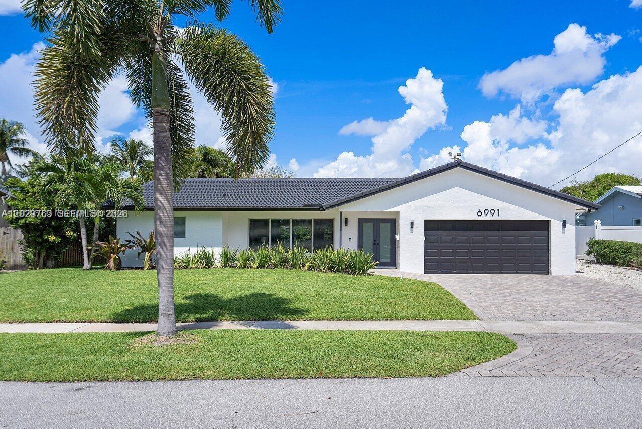 Welcome to this fully renovated & tastefully furnished single-family home located in East Boca Raton & NO HOA. With 3 bedrooms and 2 bathrooms and a 2-car garage, this home offers a comfortable & modern living space. The open-concept design creates a seamless flow between the living, dining, & kitchen areas, allowing for easy interaction and entertaining. The spacious backyard features a large pool, perfect for enjoying a refreshing swim or hosting poolside gatherings. From the flooring to the fixtures, no detail has been overlooked. Located in the multi-million dollar waterfront community Boca Harbour with easy access to shopping, restaurants, Mizner, & Downtown Delray, & excellent schools. Available for seasonal lease as well. Available August 2026.