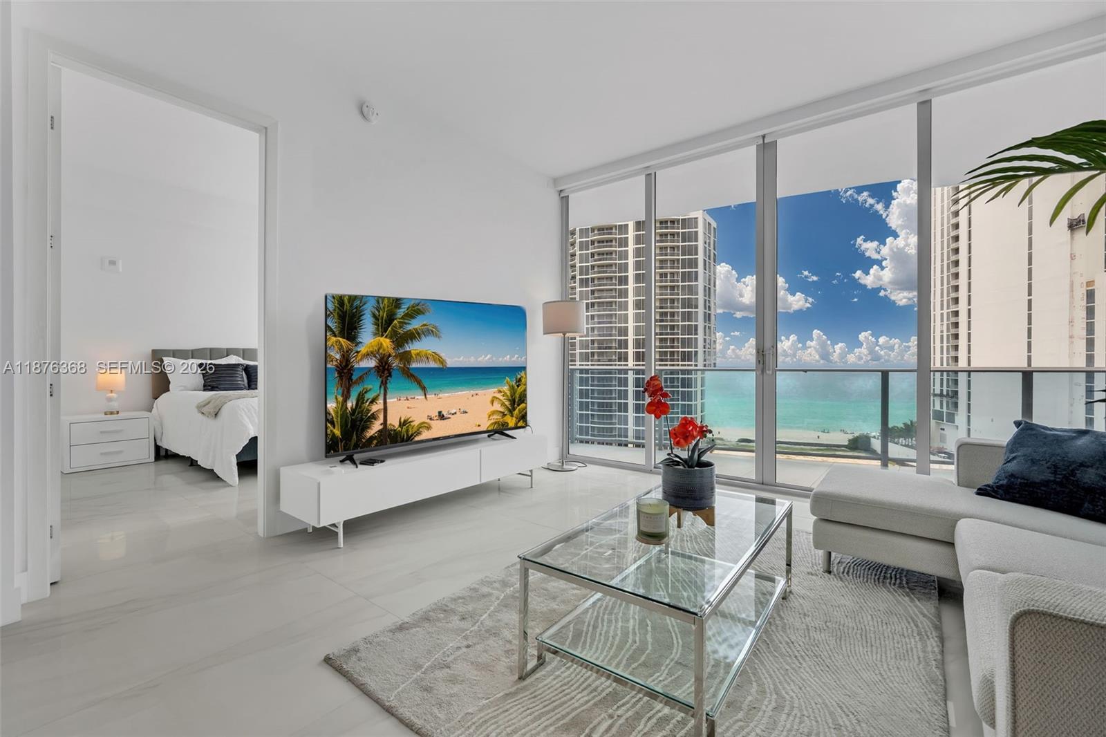 Experience breathtaking oceanfront living in this elegant 2-bedroom, 2.5-bath luxury residence at the boutique Aurora Condominium in Sunny Isles Beach. Enjoy 180° views of the Atlantic Ocean and Sunny Isles skyline from your oversized balcony or relax in the chic interior featuring designer finishes, floor-to-ceiling windows, private elevator entry, custom closets, and high-end appliances. This modern Sunny Isles condo offers resort-style amenities including a pool, spa, fitness center, sauna, kids’ room, business center, concierge, and 24-hour security. Perfectly located across from the beach, within walking distance to shops, restaurants, and parks, and minutes from Bal Harbour Shops and Aventura Mall. Live the luxury coastal lifestyle at Aurora Sunny Isles Beach. Bring your best client.