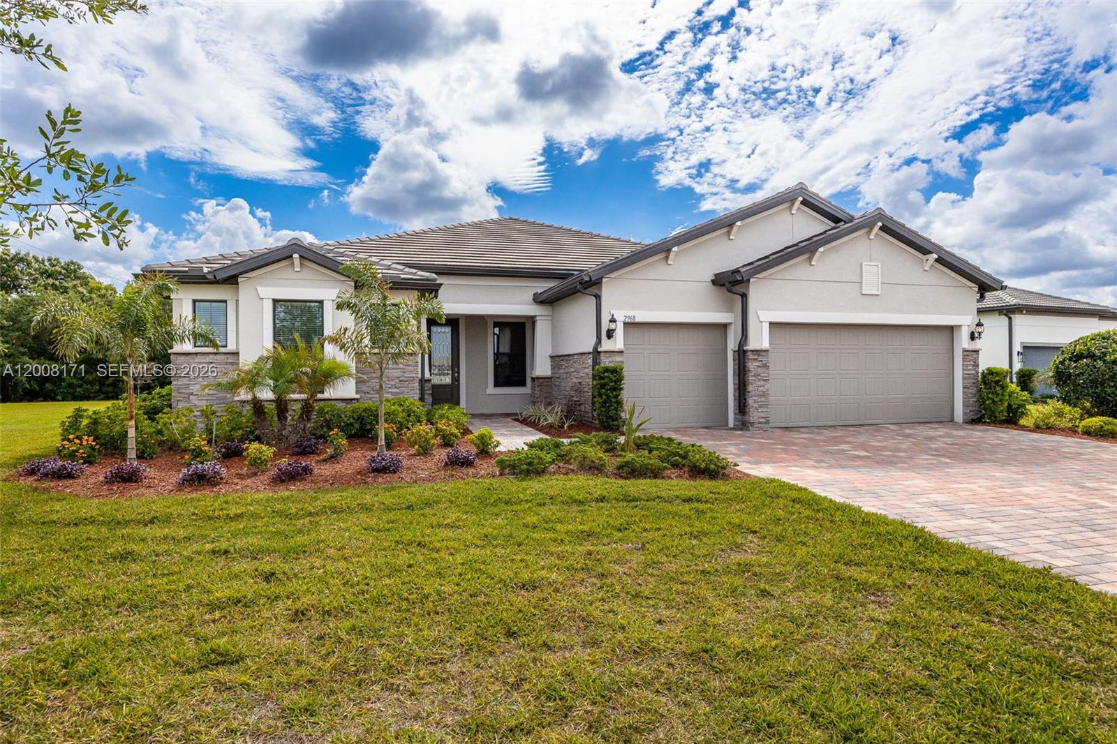 Welcome to your private retreat in the highly desirable River Hall Country Club, a premier golf course community offering luxury, privacy and the Southwest Florida lifestyle just outside Fort Myers. Surrounded by tropical landscaping, the neighborhood creates a welcoming first impression. This upgraded single-family home stands out with enhanced curb appeal and a custom inspired front elevation. Inside, a spacious foyer opens to a dedicated home office with built-in shelving, ideal for work or study. The open concept layout is designed for modern living and entertaining with upgraded lighting and zero-corner pocket sliding glass doors that fully open the home to the outdoors for seamless indoor outdoor living. The split bedroom floor plan offers generous room sizes and thoughtful separation for privacy. An extended garage with epoxy flooring adds valuable storage and utility space. Outside, the screened lanai and pool area create a private backyard escape with room for an outdoor kitchen or expanded entertaining space. Backing to a preserve with no rear neighbors, the home offers rare privacy and a peaceful backdrop. Residents of River Hall enjoy resort style amenities including a championship golf course, community pool, on site dining, fitness center, pickleball courts and walking and biking paths with a golf cart friendly lifestyle. This home delivers upgraded finishes, privacy and premier community living in one of Southwest Florida’s most sought after golf neighborhoods.