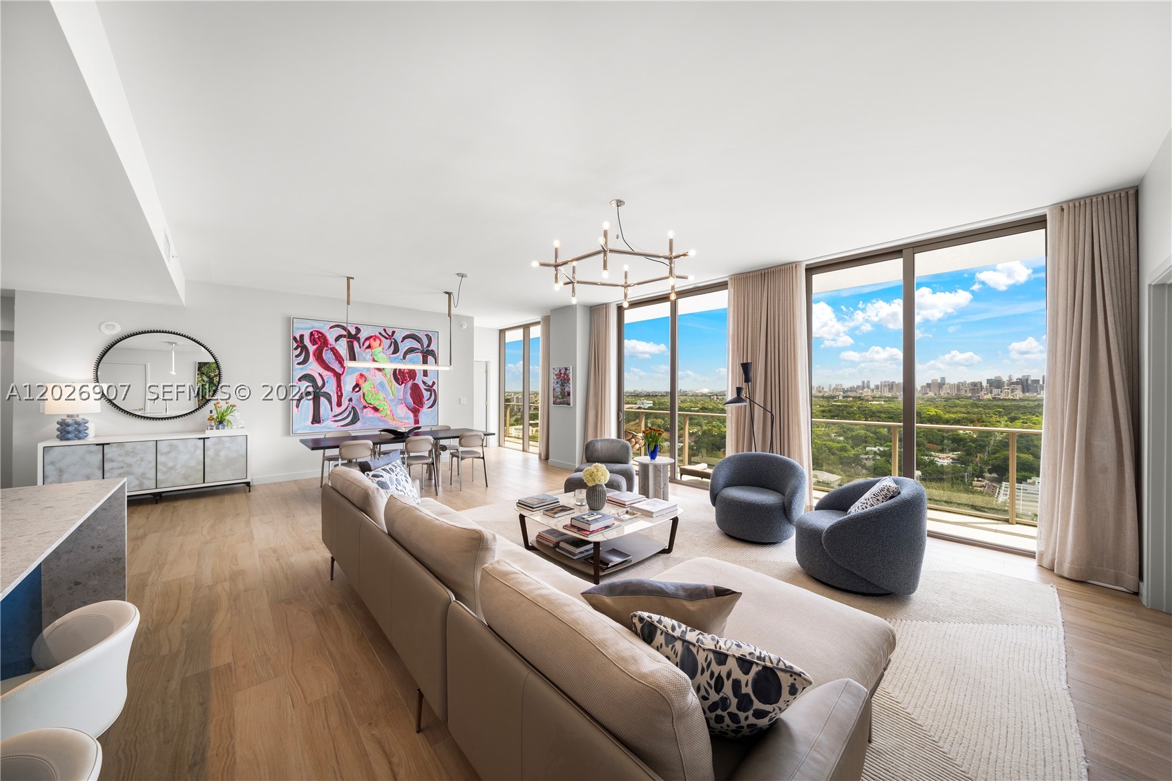 Experience elevated living in the heart of Coconut Grove in this exceptional 2,534 SF 3-bedroom, 3.5-bath corner residence in the coveted 02 line at Mr. C Residences. Just a short walk to the Grove town center, waterfront parks, marinas, dining, and boutique shopping, this home blends luxury with convenience. One of the larger three-bedroom layouts in the building, it features 11-foot ceilings, floor-to-ceiling glass with stunning western skyline and bay views, a wraparound balcony, chef’s kitchen with premium appliances and oversized pantry, spacious primary suite with spa-like bath, en-suite guest bedrooms, powder room, laundry area, ample storage, and two assigned parking spaces. Residents enjoy exclusive Mr. C amenities, including two resort-style pools, spa access, concierge services, and La Specialità Café and Market. Designer furnishings may be purchased, offering a turnkey opportunity for buyers seeking a seamless move-in experience.