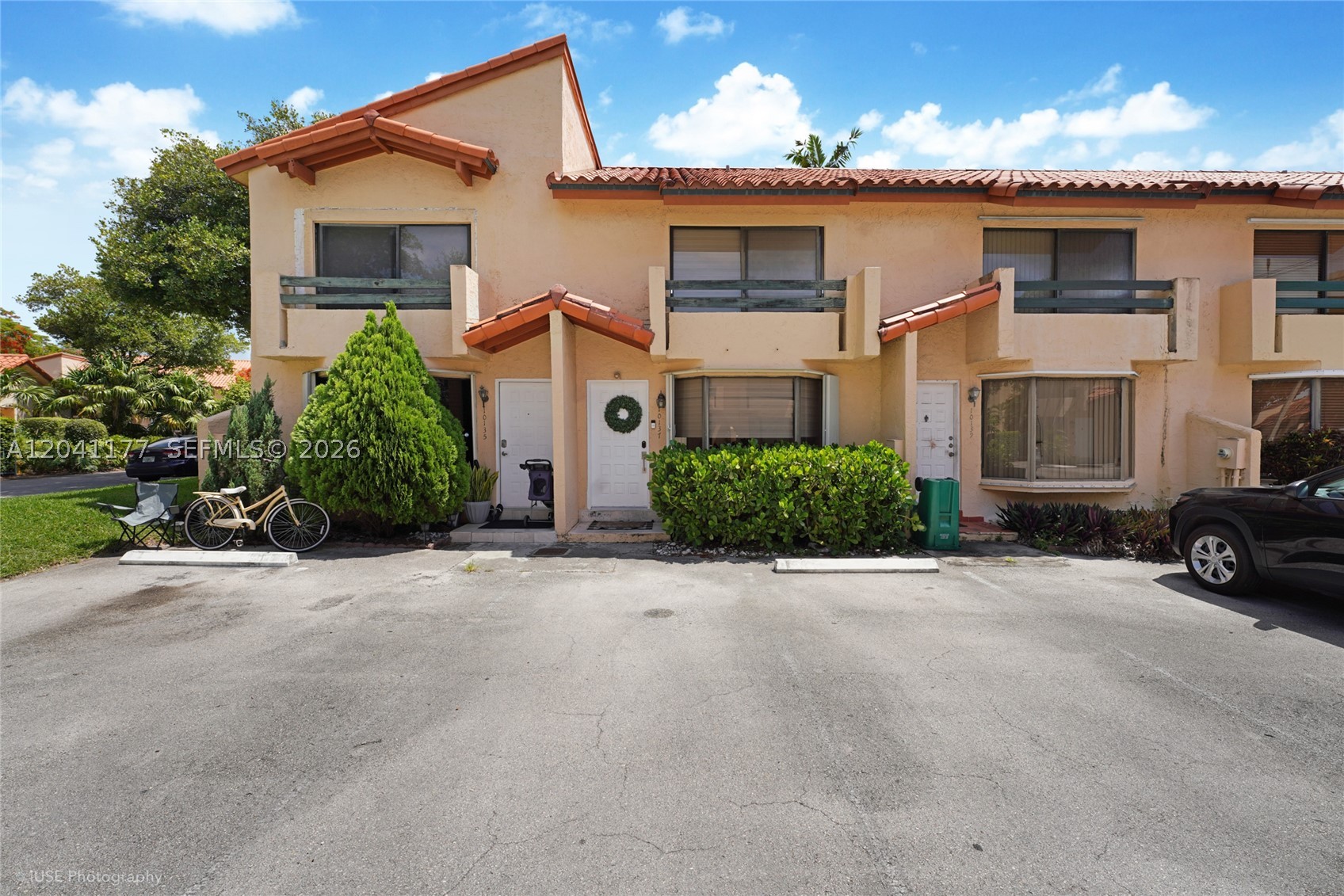 Beautifully remodeled and move-in ready, this special townhouse in sought-after Dadeland Cove offers the perfect blend of style, comfort, and convenience. Featuring 2 bedrooms and 2.5 bathrooms, the home has been thoughtfully updated throughout. The updated kitchen flows seamlessly into the family room and opens to a private patio, creating the perfect space for everyday living and entertaining. The spacious primary suite includes built-out closets and a versatile loft space ideal for a home office, reading nook, or additional storage. Ideally situated just steps from the community pool, this residence also includes two designated parking spaces directly in front of the home, along with guest parking. Enjoy a prime central location close to major highways, shopping, dining, and everything the Dadeland area has to offer.