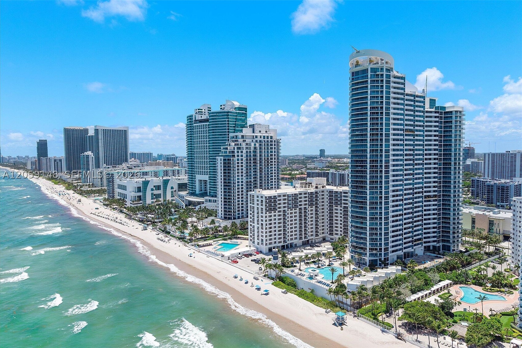 Perched on the 36th floor of the prestigious Ocean Palms, this exceptional fully furnished residence offers the ultimate in luxury beachfront living with breathtaking panoramic views of the Atlantic Ocean, Intracoastal Waterway, and sparkling city skyline from two expansive private balconies. A semi-private elevator opens into your exclusive foyer, creating a grand entrance to this meticulously designed 3-bedroom, 3.5-bath home where no expense has been spared.

Each spacious bedroom suite features spectacular ocean views, a private en-suite bathroom, and a generous walk-in closet, providing exceptional comfort and privacy. Floor-to-ceiling windows flood the residence with natural light while showcasing stunning water views throughout.

Ocean Palms delivers a true five-star resort lifestyle with world-class amenities including 24-hour security, valet parking, direct beach access, an infinity-edge oceanfront pool with towel and chair service, Jacuzzi spa, two-story state-of-the-art fitness center, yoga/Pilates studio, tennis and basketball courts, billiards room, private movie theater, business center, activity room, BBQ area, and beautifully appointed social gathering spaces.

Offered completely furnished and including a dedicated covered parking space, this turnkey residence presents an extraordinary opportunity to own one of South Florida's premier luxury oceanfront homes.
