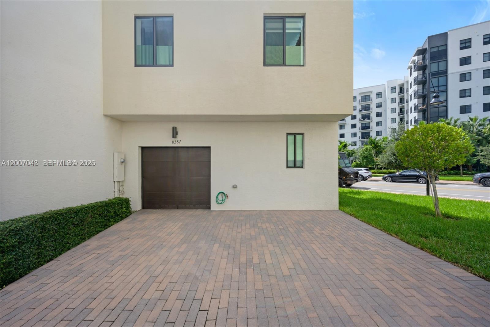 Modern 3-story corner townhouse in the highly sought-after Urbana at Downtown Doral, designed for both style and functionality. Bright, open-concept interiors showcase a sleek gourmet kitchen with quartz countertops, stainless steel appliances, and spacious living and dining areas ideal for everyday living and entertaining.The second level features a private retreat with a luxurious primary suite offering a spa-style bathroom and dual walk-in closets, along with two additional bedrooms, a full bath, and a full-size washer and dryer for added convenience.Enjoy seamless indoor-outdoor living with multiple balconies, expansive terraces, and a stunning rooftop featuring a fully equipped summer kitchen and BBQ area perfect for entertaining while taking in beautiful sunset views.Residents enjoy exclusive access to Urbana’s resort-style amenities, including a clubhouse with an indoor basketball court, state-of-the-art fitness center, resort-style pool, spa, children’s splash zone, and social spaces all just steps from Downtown Doral’s premier dining, shopping, and entertainment.A rare opportunity to own a modern residence in one of Doral’s most vibrant and desirable communities.