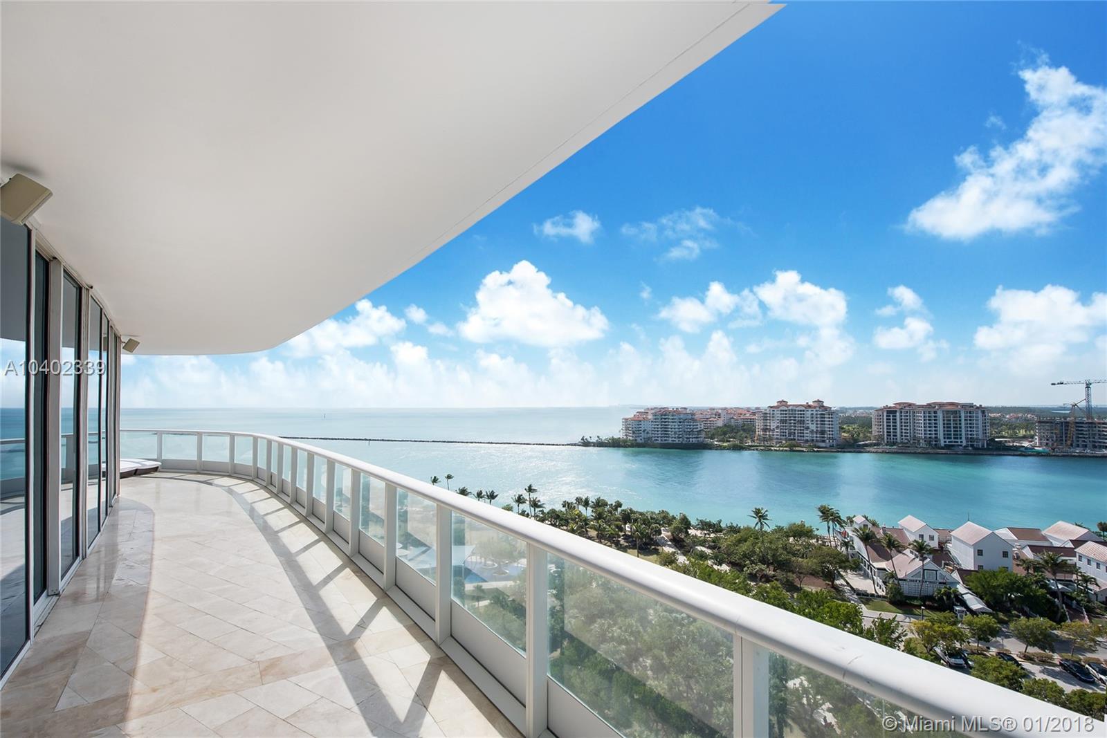Rare & most saught after south east corner residence features the most luxurious and expansive two bedroom floor plan in the tower! Impressive views through its wall to wall, floor to ceiling glass with soaring 10ft high ceilings capture every sunrise and sunset. The home boast beautiful custom features and murals throughout. Gourmet kitchen includes a breakfast room, SubZero & Miele appliances. A lavish 600sf rotunda terrace commands pristine views of the beach, South Pointe Park, parading cruise ships, Fisher Island & Miami skyline. Three levels of security include guard house, bio-metric entry & private lobby. Professional concierge, private restaurant & beach club, 18k SQFT Gym/Spa & 3 clay courts all awaits you on 12.5 acre beachfront oasis in the very best location of South of Fifth.