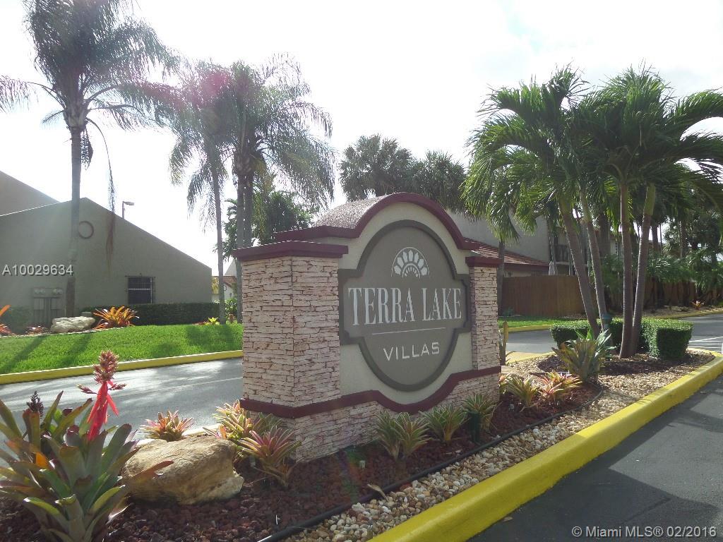 Convenient location close to shopping, highway, park and more.. Beautiful & spacious 2 stories townhouse with 3 bedrooms,2+ 1/2  baths in a well maintained community Terra Lake. Wide kitchen with stainless steel appliances, full size washer & dryer, fenced private patio, tile floor in the entire unit, 2 assigned parking spaces in front of the property.