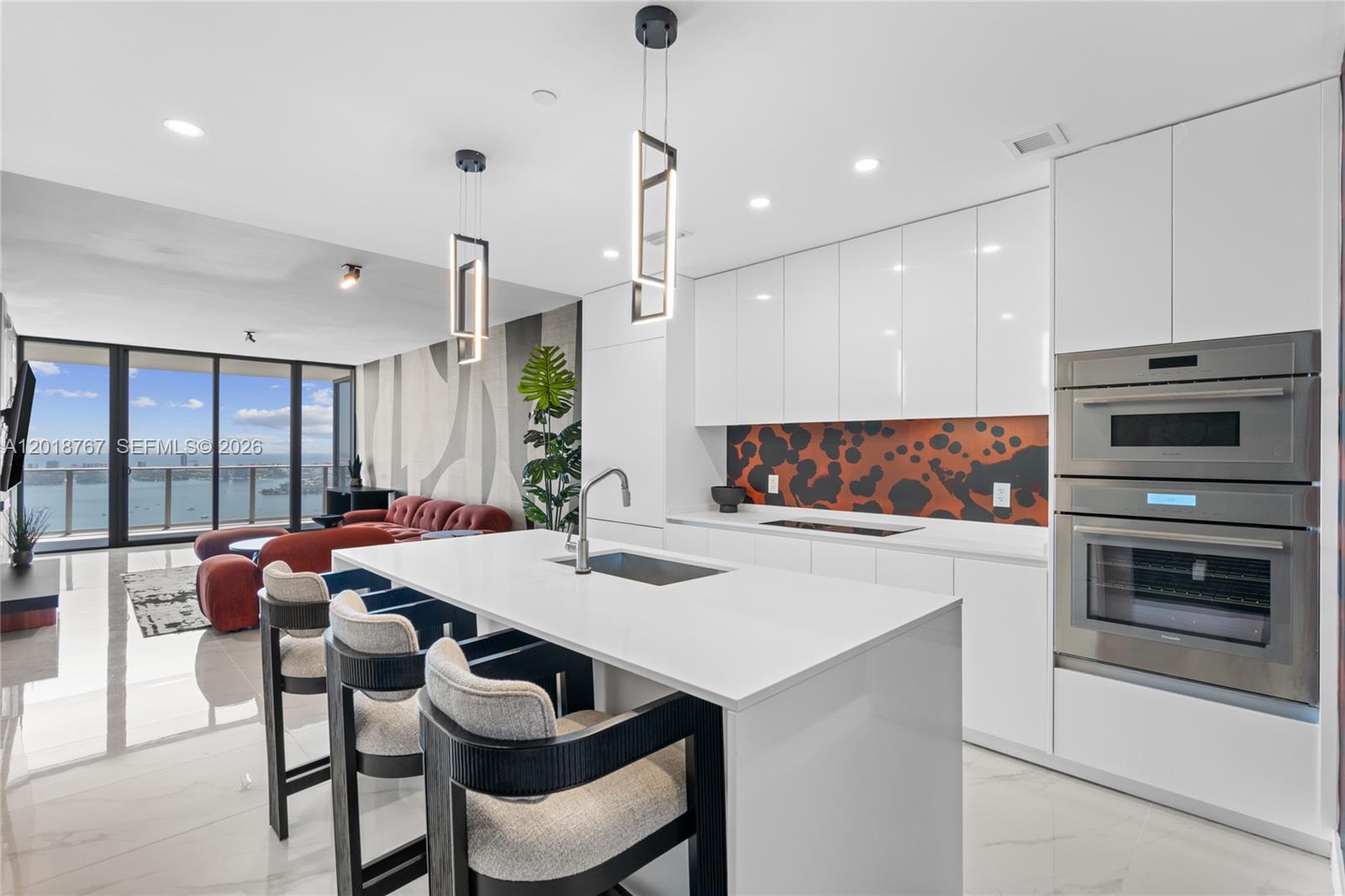 Experience elevated waterfront living at Aria Reserve Miami, the tallest residential waterfront dual-tower development in the United States. Residence 5206 features 2 bedrooms + office, 3 bathrooms, and 1,832 total SF, offering breathtaking panoramic views of Biscayne Bay, Miami Beach, and the city skyline from an expansive private terrace. This luxury residence showcases floor-to-ceiling glass, 10-foot ceilings, premium Thermador appliances, European cabinetry, quartz countertops, custom closets, and spa-inspired bathrooms. Residents enjoy over 2 acres of world-class resort-style amenities including multiple pools, spa, fitness center, tennis and pickleball courts, private marina access, co-working spaces, valet, concierge, and more. Ideally located in Edgewater, just minutes from Brickell, Design District, Wynwood, Downtown Miami, and Miami Beach.