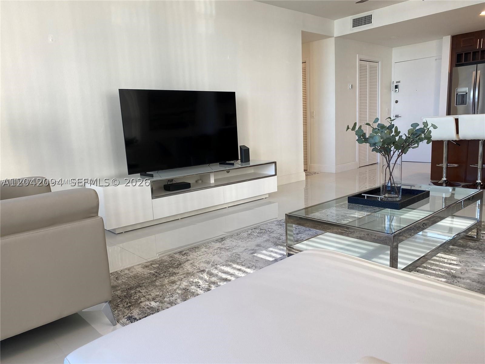 ALEXANDER TOWERS CONDO - Residential Lease