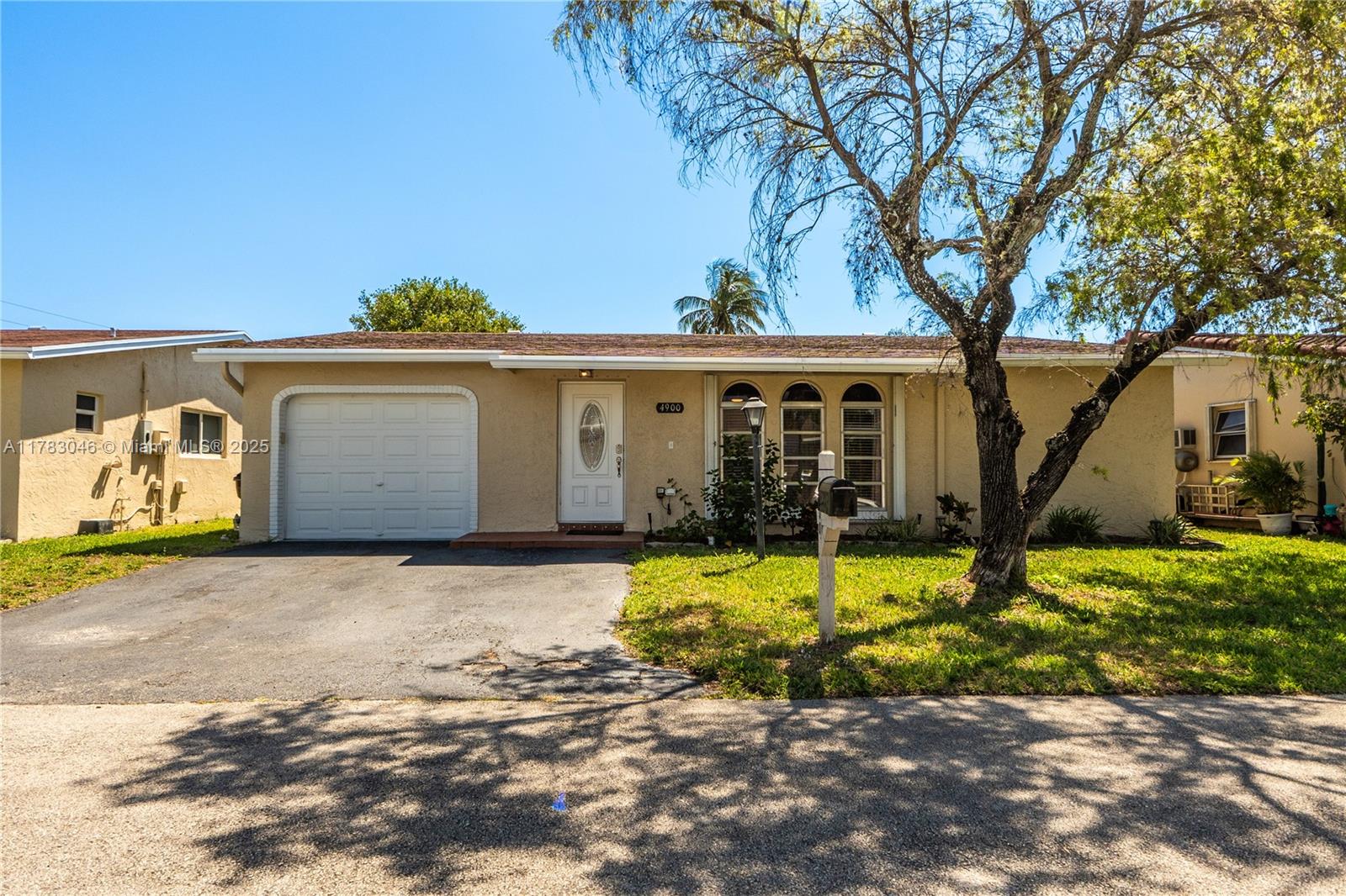 Welcome home to comfort and convenience in the beautifully maintained Crystal Lake community of Deerfield Beach! This 2-bed, 2-bath single-family home features a split floorplan for added privacy, a spacious living room, dining area, and a kitchen that opens to the family room. Sliding glass doors from both the living and family rooms lead to an oversized screened-in and covered patio—perfect for relaxing or entertaining. The home includes a 1-car garage, hurricane shutters, and an impact garage door, and is in excellent condition. Crystal Lake offers a low HOA with resort-style amenities: pool, brand-new gym, saunas, jacuzzi, billiards, library, and more. Minutes to I-95, shopping, dining, Quiet Waters Park, and just a short drive to the beach!