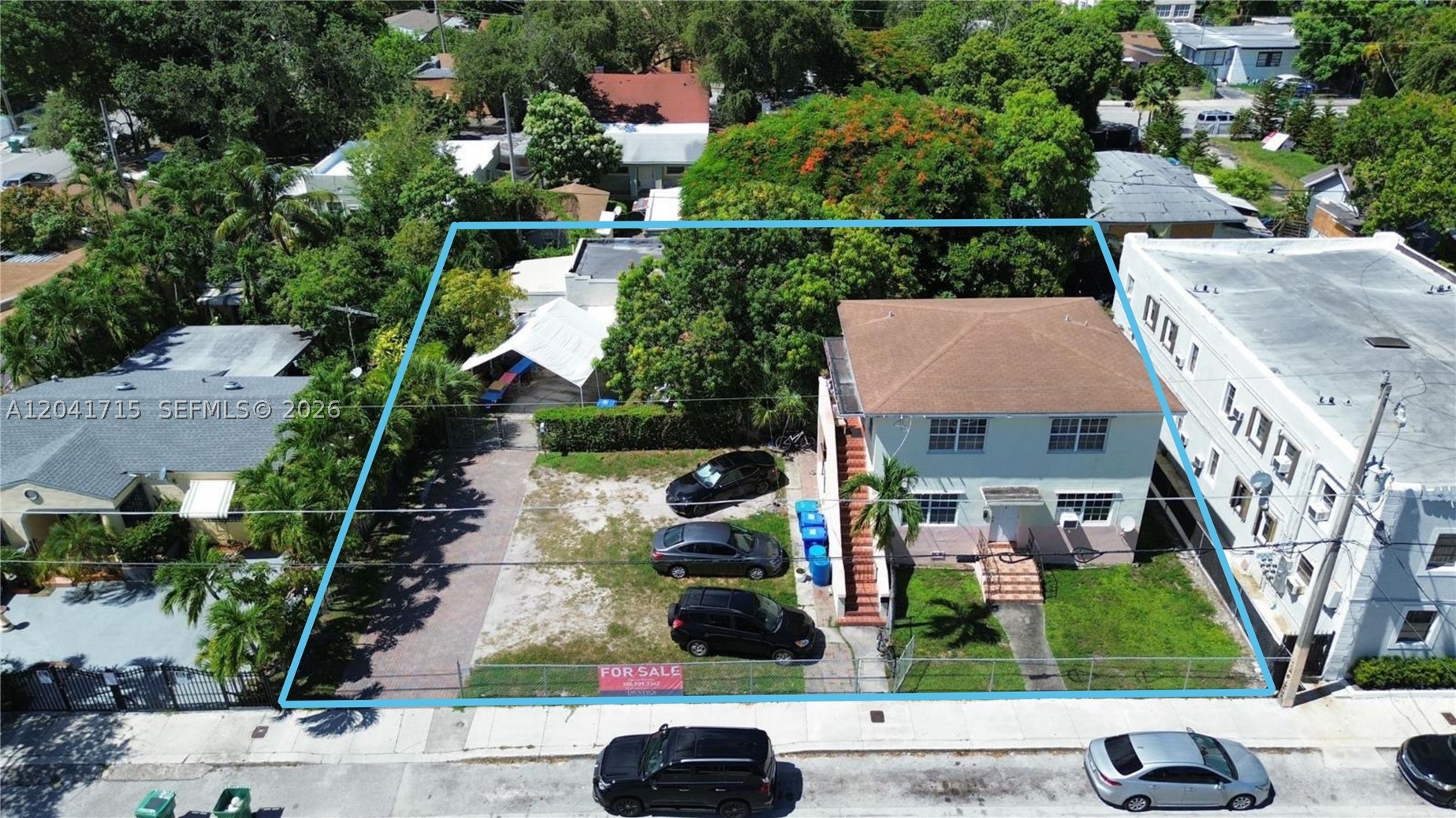 Rare opportunity in the heart of Wynwood Norte, one of Miami's fastest-growing urban neighborhoods. Situated on an approximately 10,000 SF double lot and zoned T4-R with the NRD-2 Overlay, the property offers significant redevelopment potential, with the possibility to develop approximately 34 residential units. The property is currently consists of two existing structures, including a two-story duplex and a separate single-family residence, creating immediate income-producing opportunities while future development plans are pursued. Investors may choose to continue operating the existing improvements, renovate and reposition the property for increased rental income, occupy one of the residences while generating income from the remaining units, or assemble neighboring parcels to create a larger-scale development opportunity. Located just minutes from Wynwood, Midtown Miami, the Design District, and major transportation corridors including I-95 and I-195, the property benefits from strong demand drivers, walkability, and continued public and private investment throughout the area. Whether acquired as a long-term land bank, an income-producing covered land play, a value-add renovation project, or a future multifamily development site, 255 NW 32nd Street offers investors and developers multiple paths to create value in one of Miami's most dynamic growth corridors.