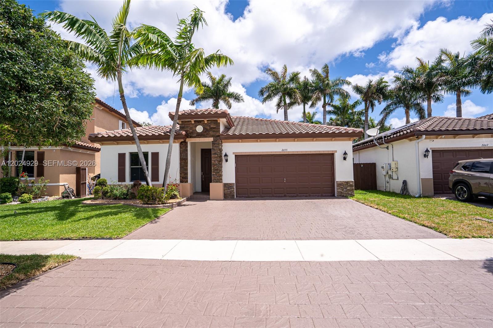 Welcome to this beautiful home located in one of the most desirable communities in Homestead, Florida. This spacious property features 4 bedrooms and 3 full bathrooms, including a large primary suite with a fantastic bathroom complete with both a bathtub and separate shower. The home offers a fenced yard, two private entrances, a lovely patio area, ceiling fans throughout, and parking space for up to 4 cars in the front driveway and 
2 car garage. Situated in a secure and peaceful neighborhood, it provides convenient access to major roads and highways while maintaining a relaxing coastal atmosphere. Enjoy one of the lowest HOA fees in South Florida along with exceptional community amenities, including a stunning clubhouse, resort-style pool, renovated gym, sauna, jacuzzi, children’s water splash area, and an elegant event salon for parties and gatherings. Ideally located just minutes from marinas, the Florida Keys, Florida City Outlet Mall, shopping centers, and excellent restaurants. The area also offers highly rated schools at all levels and close proximity to major universities. This home perfectly combines city convenience with coastal tranquility. Don’t miss the opportunity to see this fantastic property!